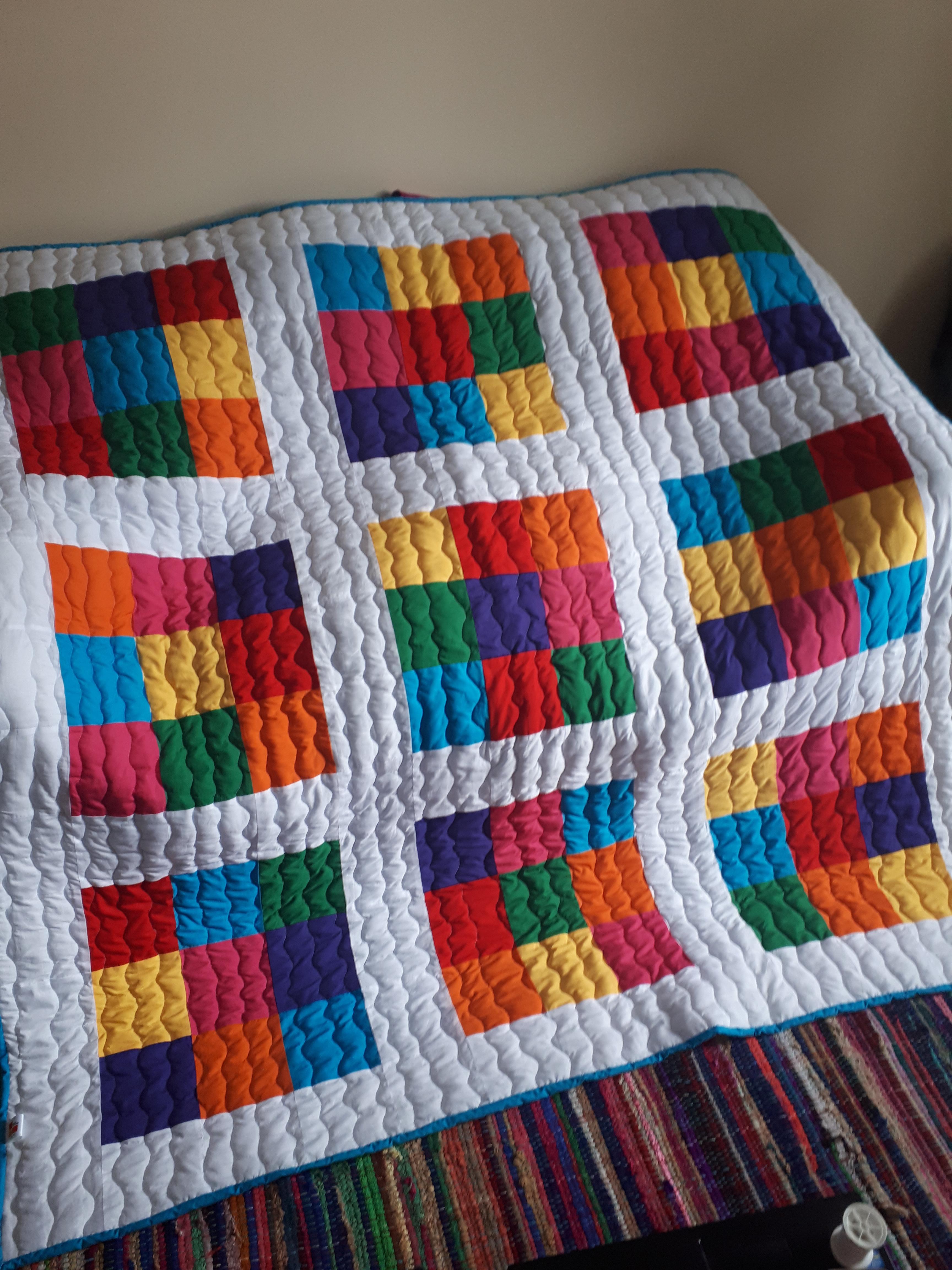 Finished rainbow quilt 😊 A take on the module quilt by Christine Barnes