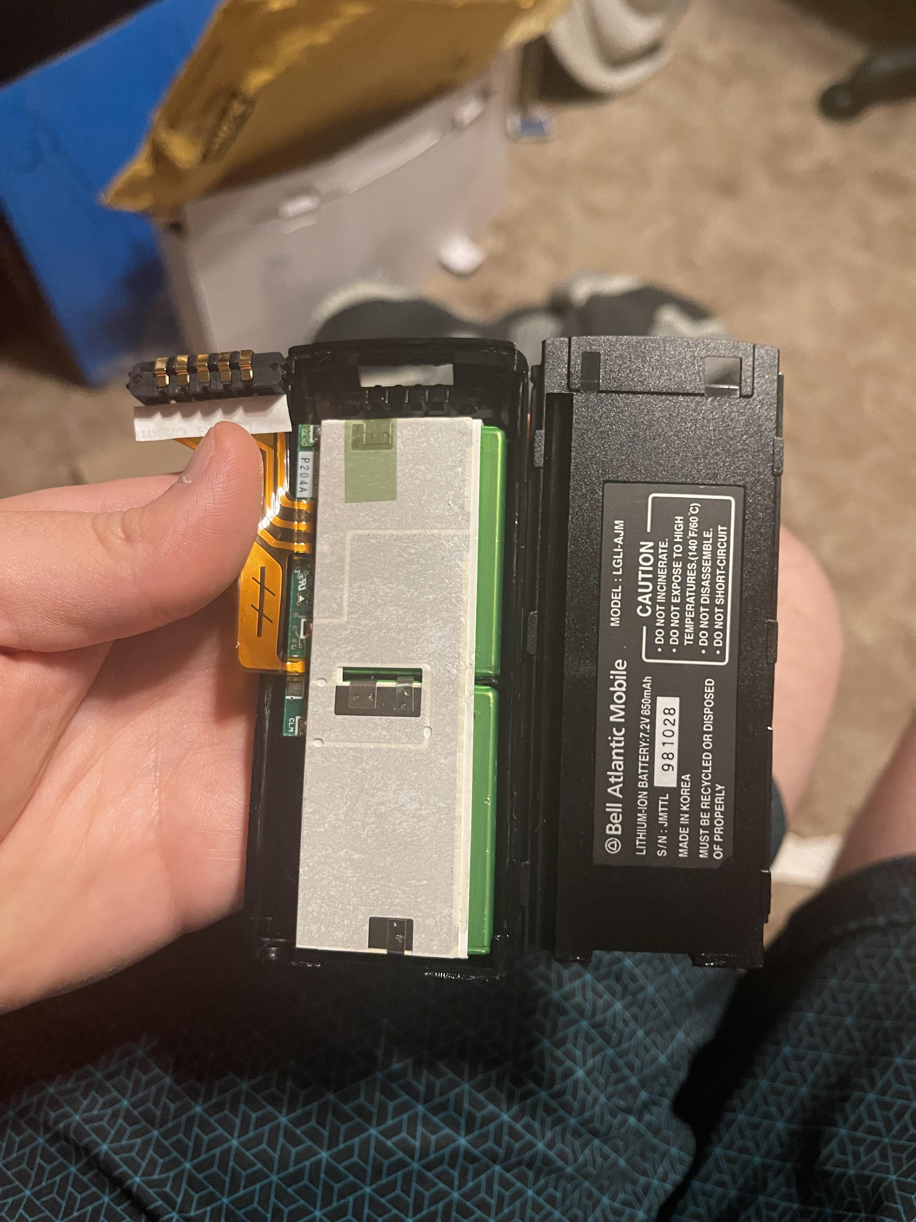 Trying to revive this old completely discharged phone battery. I tried