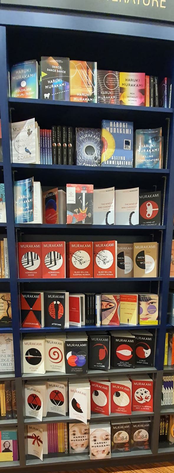 There is a whole shelf of Murakami books at the Kinokuniya here. r