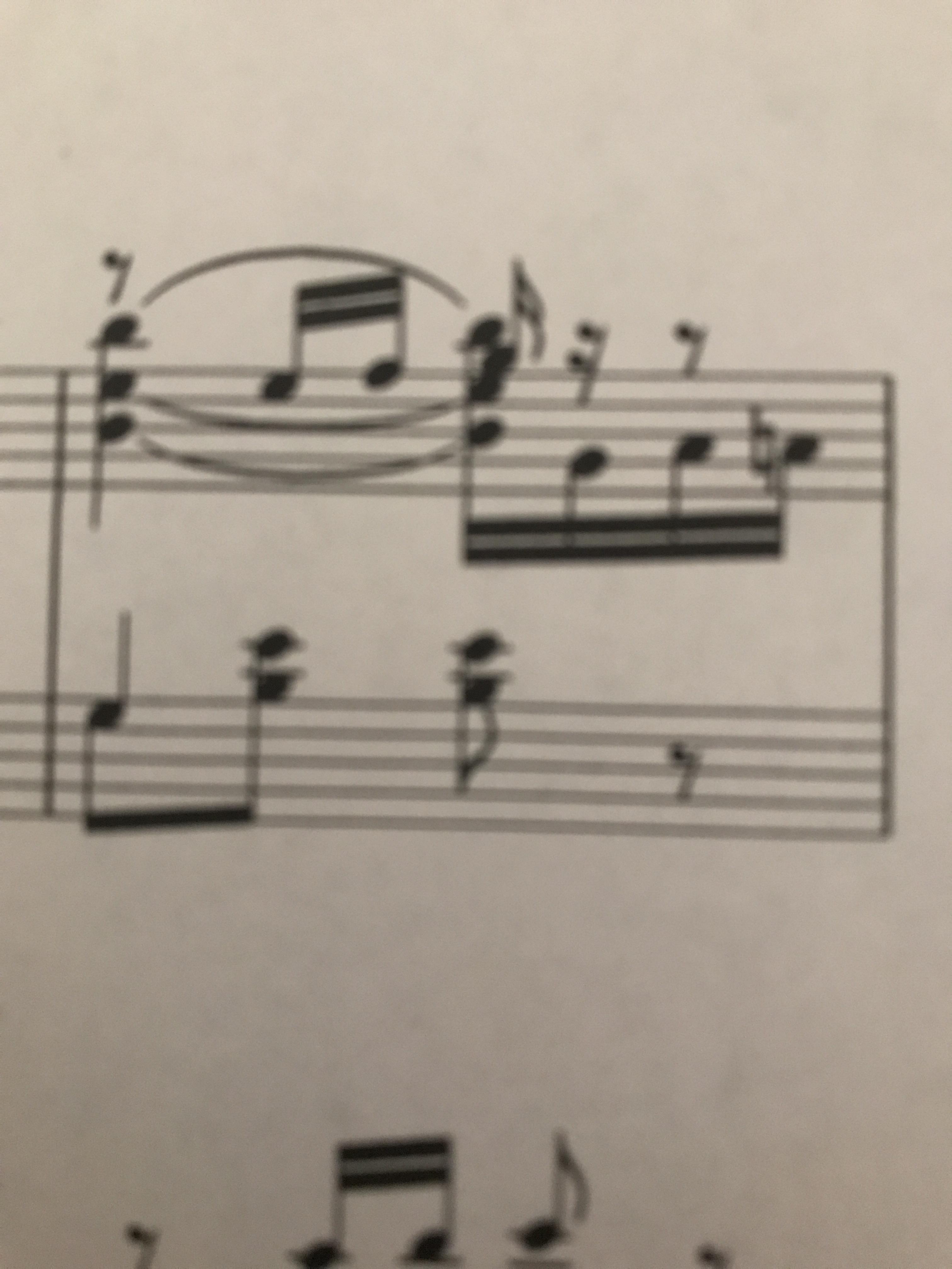 How do I play this right hand part? What does the rest above the note