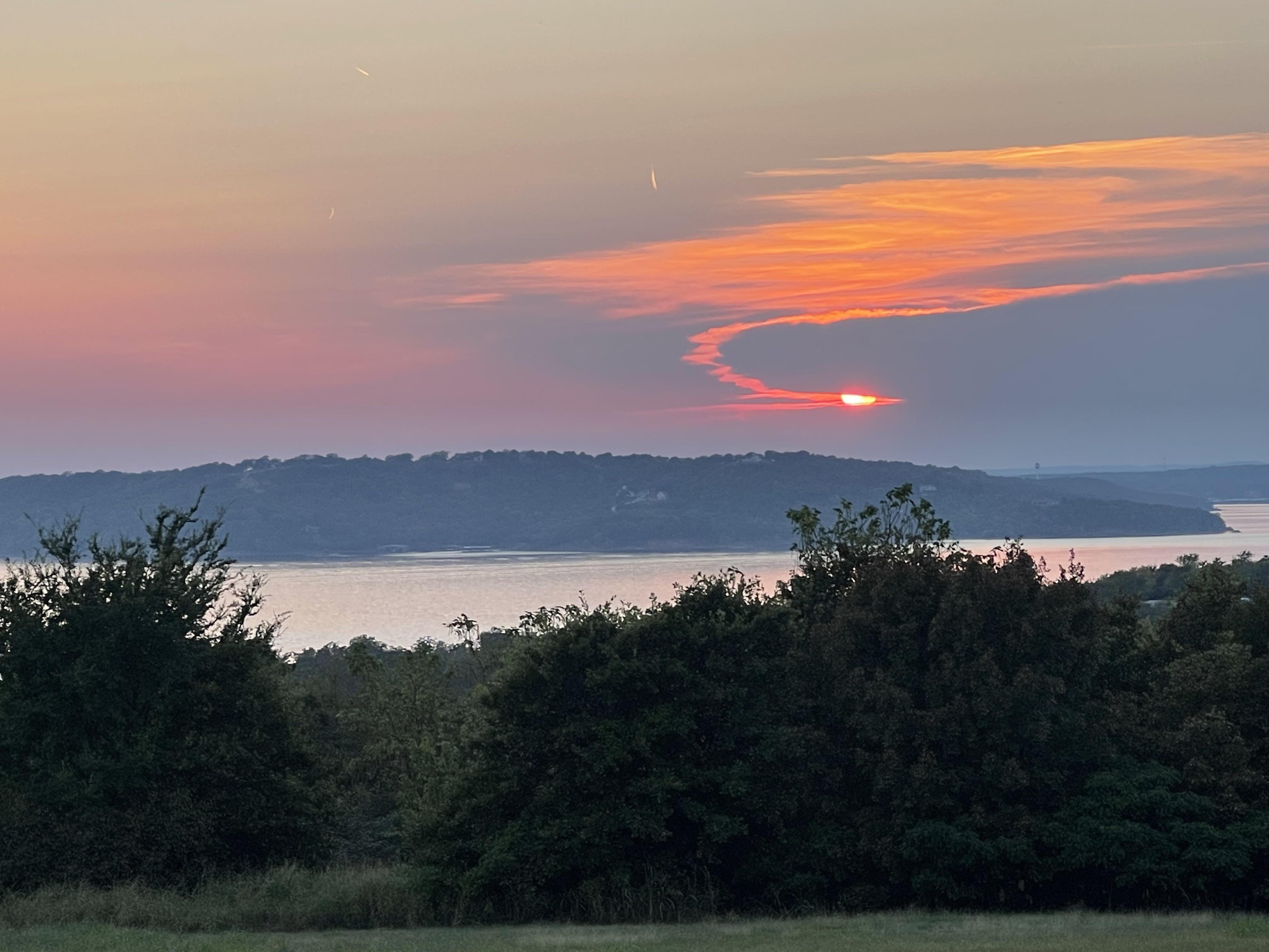 Lake Eufaula, OK. I love the curve with sun peeking through. [OC] r
