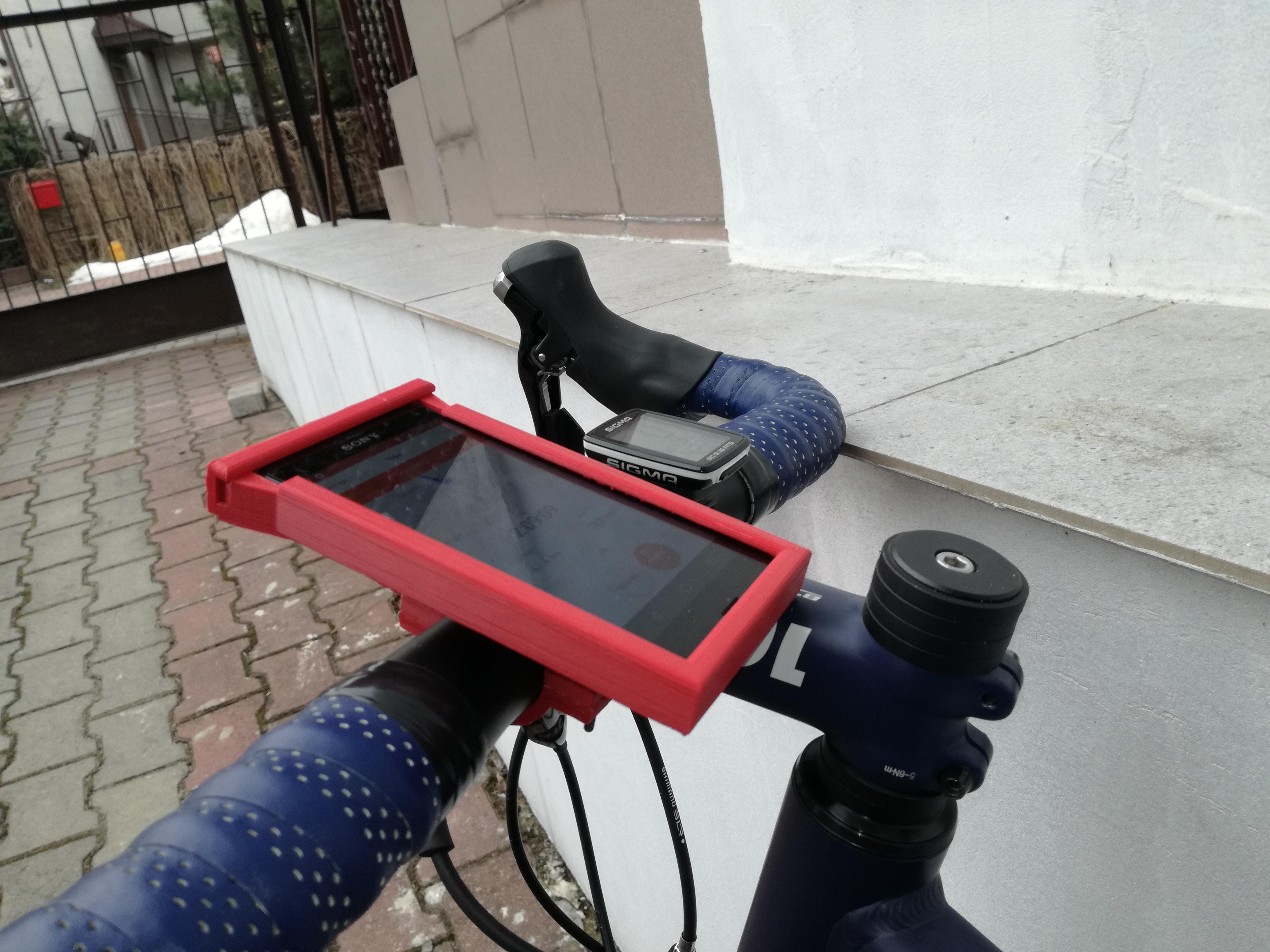 I designed and 3D printed my bike phone mount and just came back from