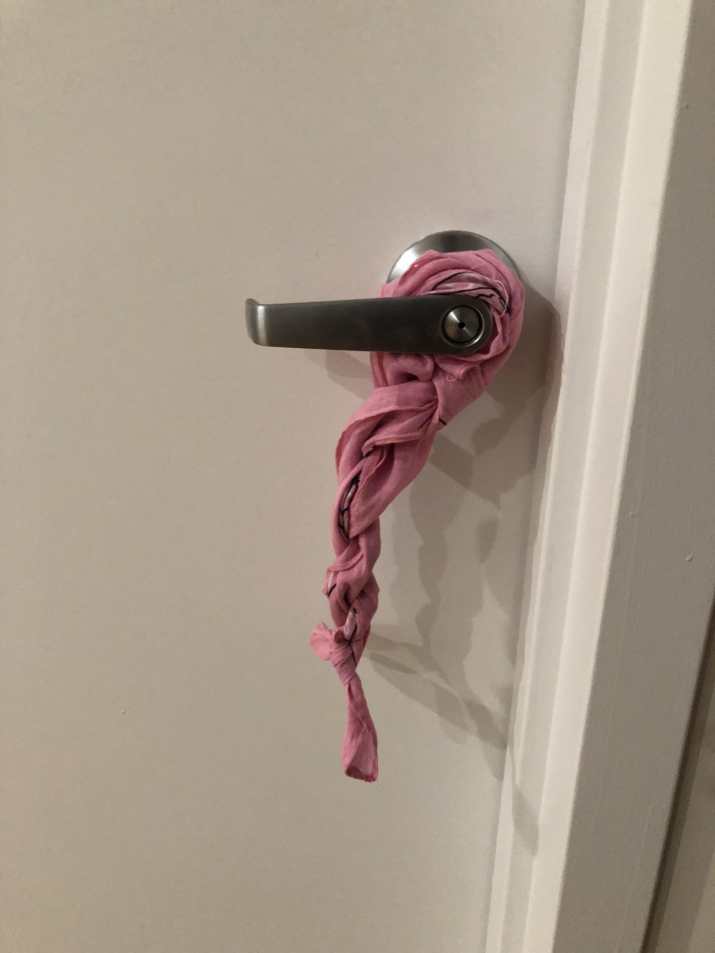 What does this tied up piece of cloth on my roommate's door mean? r