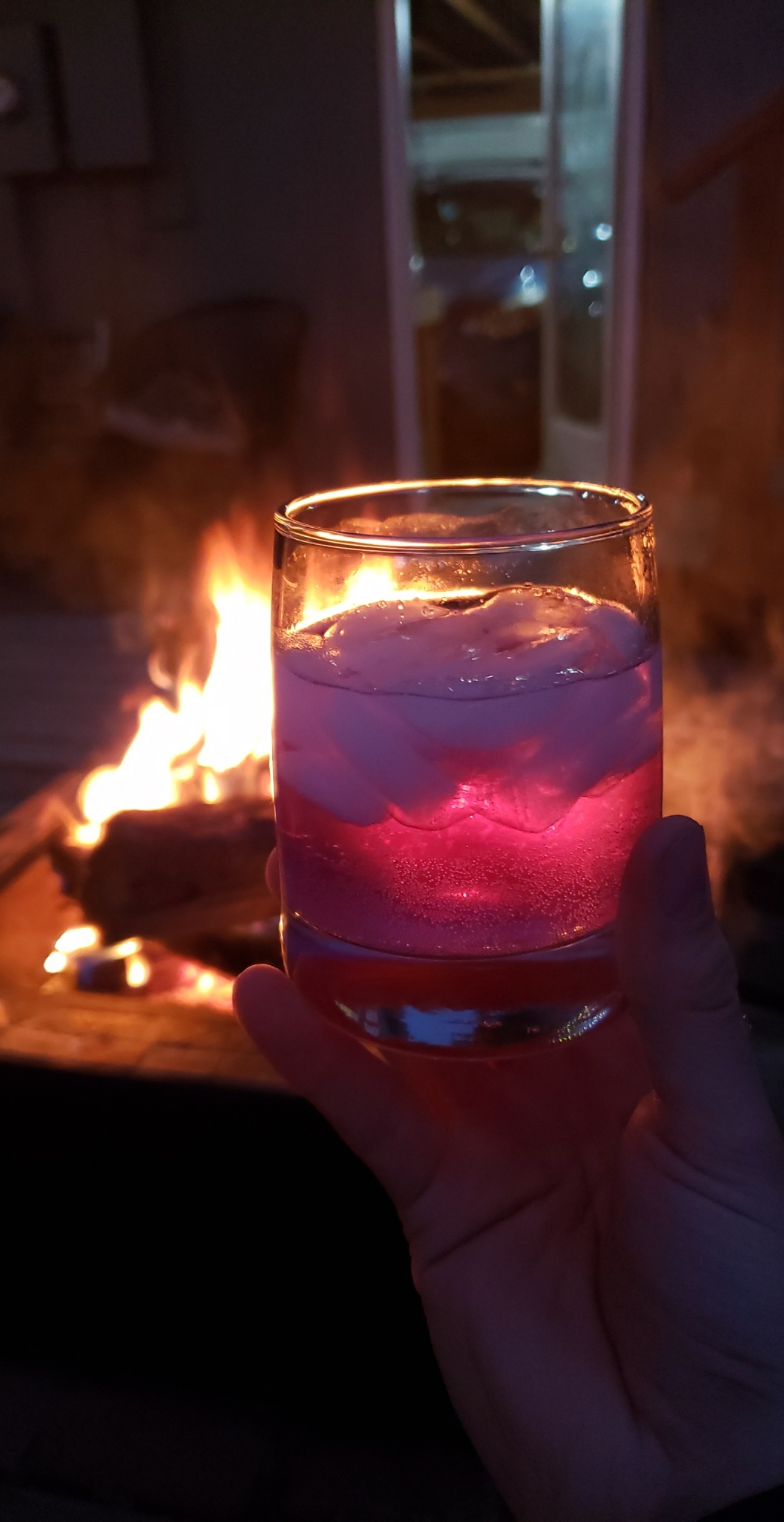Empress gin with an elderflower tonic in front of a roaring fire. Does