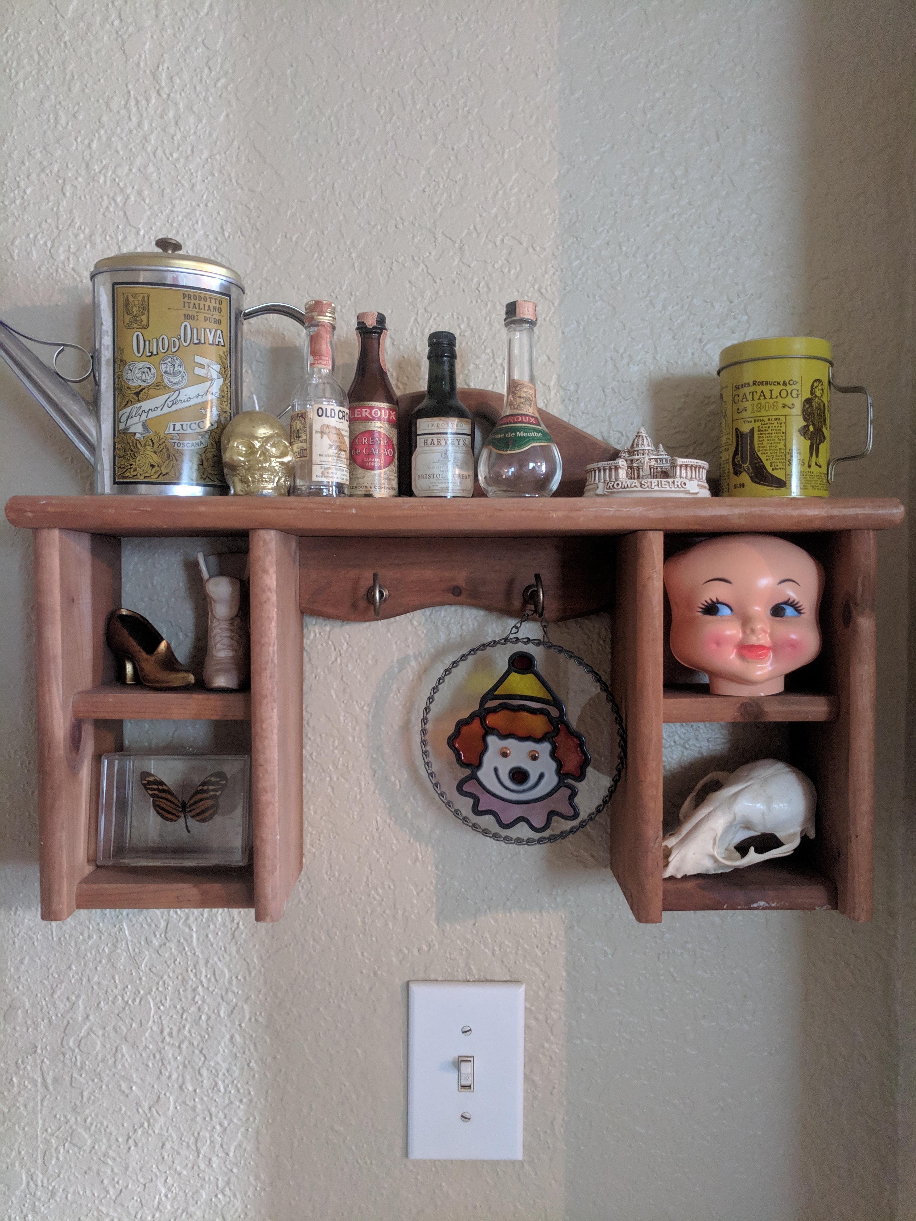 Set Of Shelves For Knick Knacks Crossword One of my many shelves filled with odd, entirely thrifted useless knick