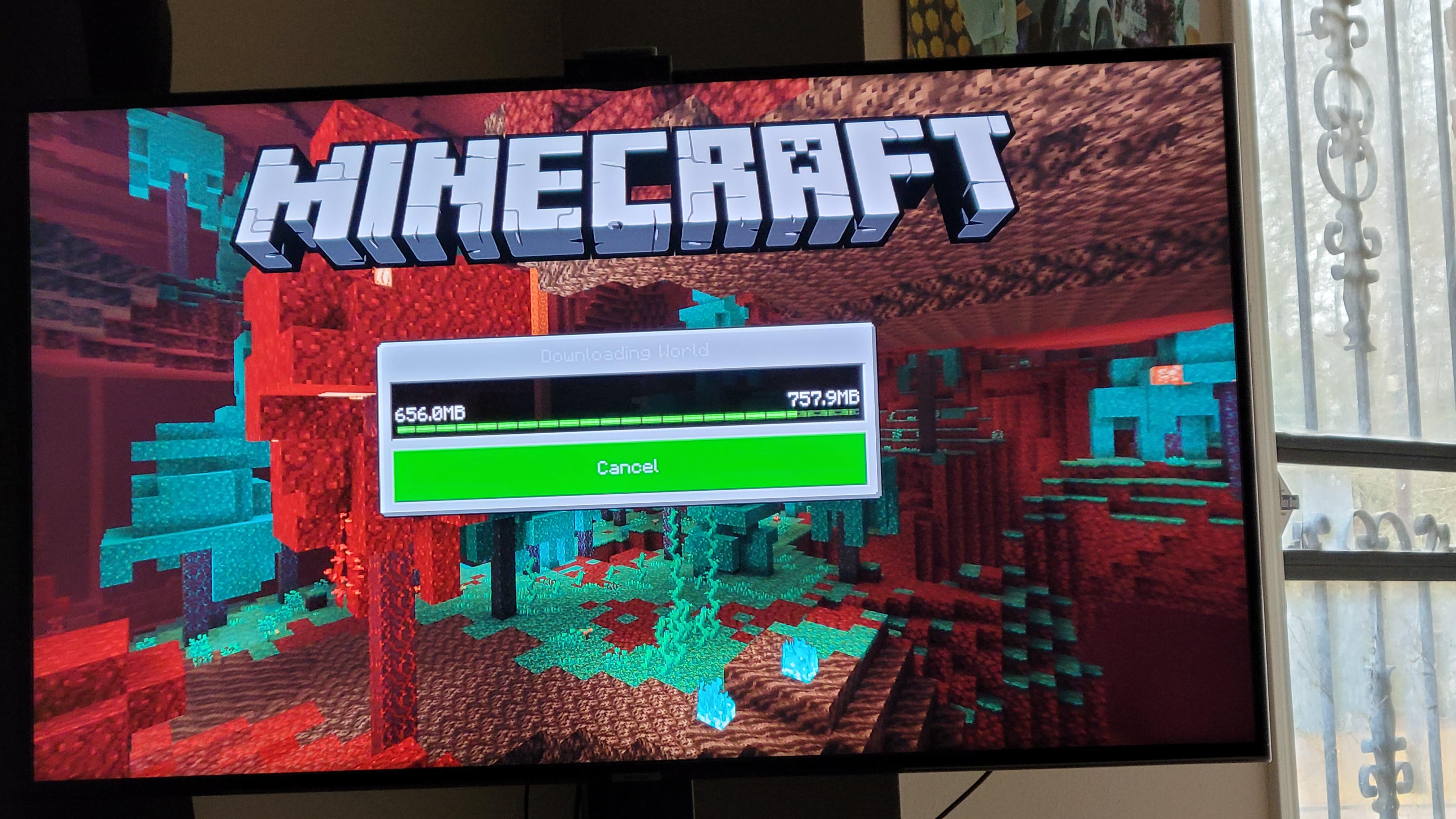 Everytime I try to download my realms world of freezes on 656mb. I have