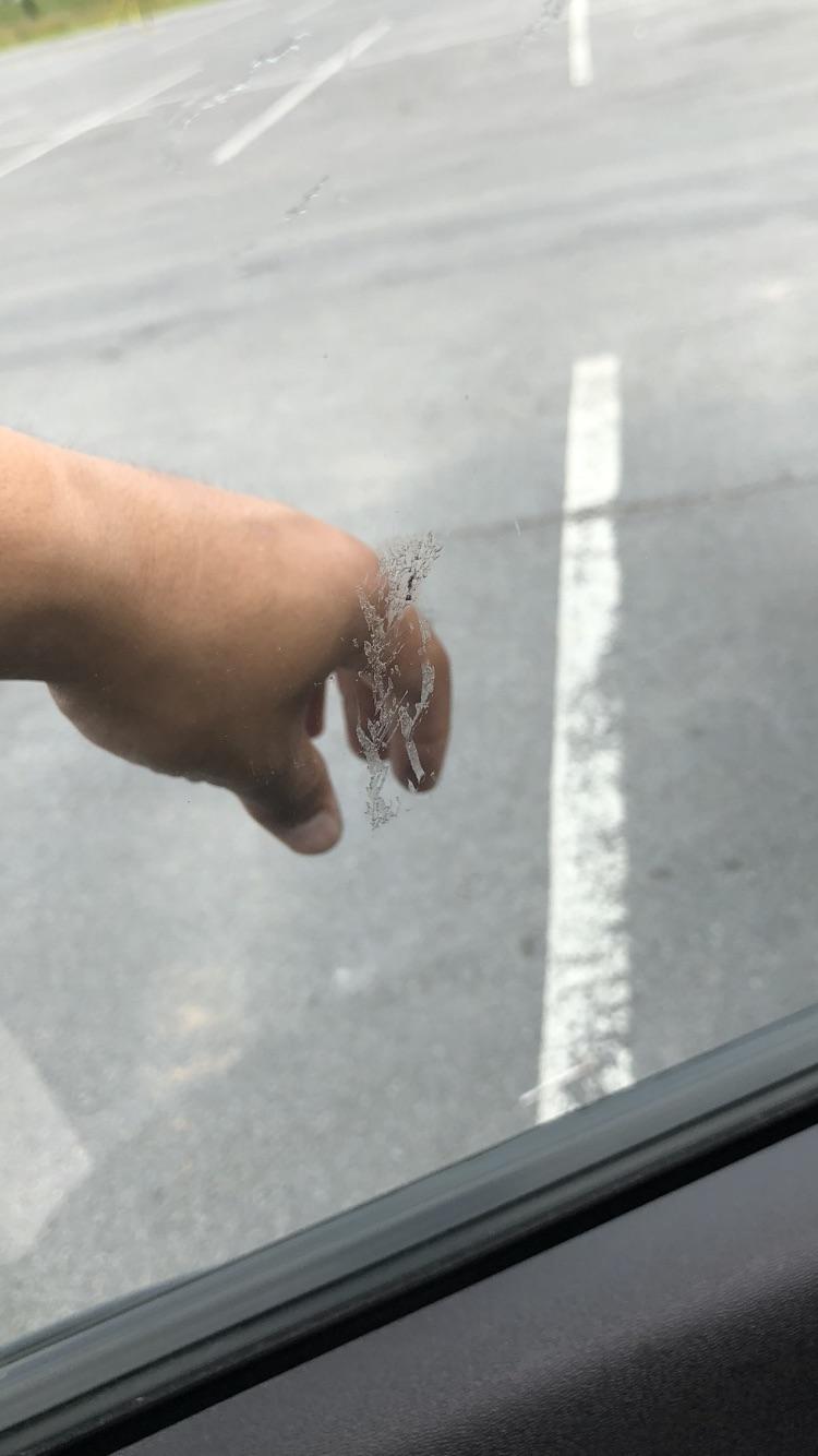 Best way to get rid of this of car window?? Just keeps smearing r