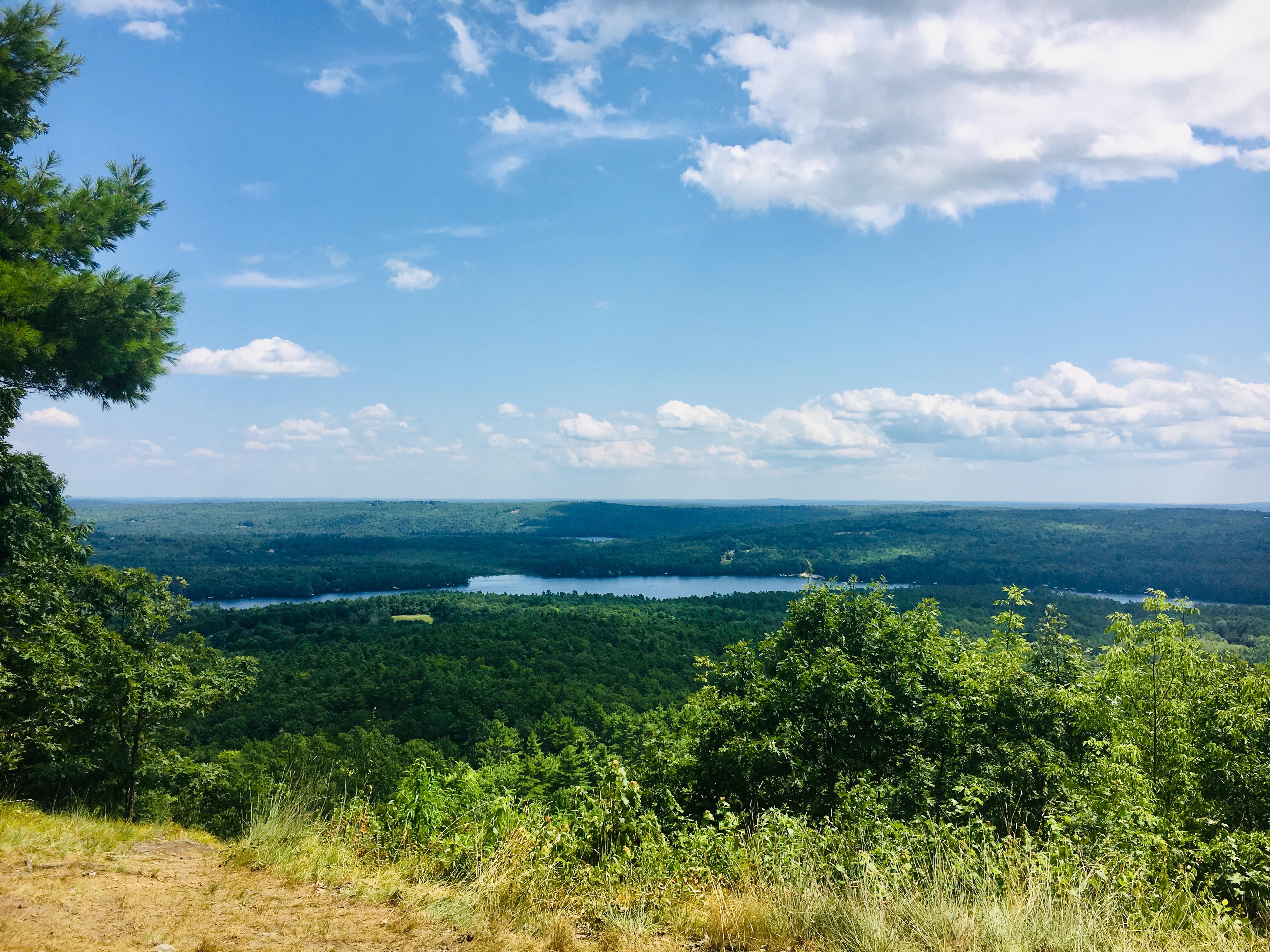 A view of the Maine landscape from the top of a hill r/Maine