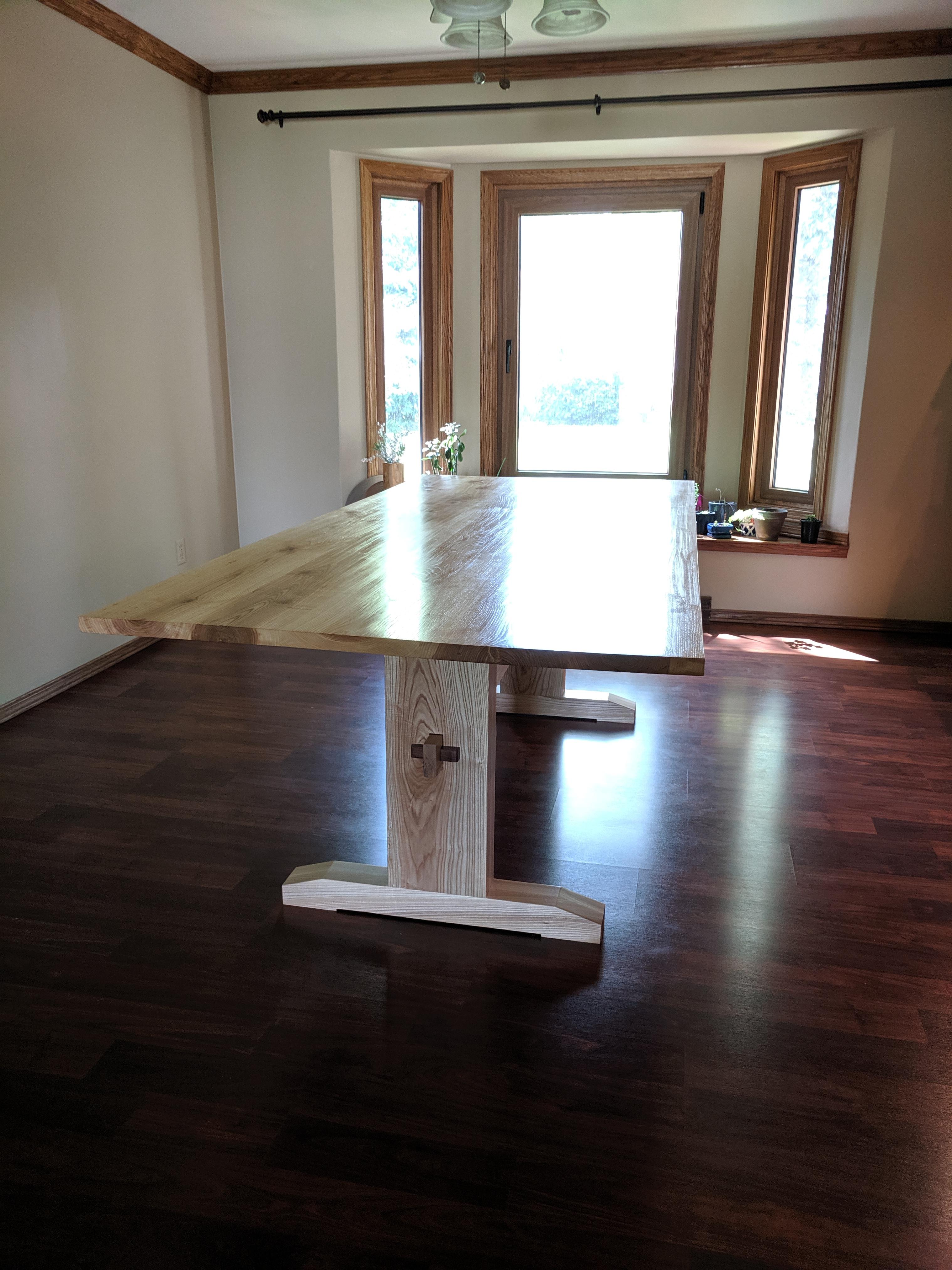Finally finished up my dining table. Made from Ash trees taken down at my childhood home. r
