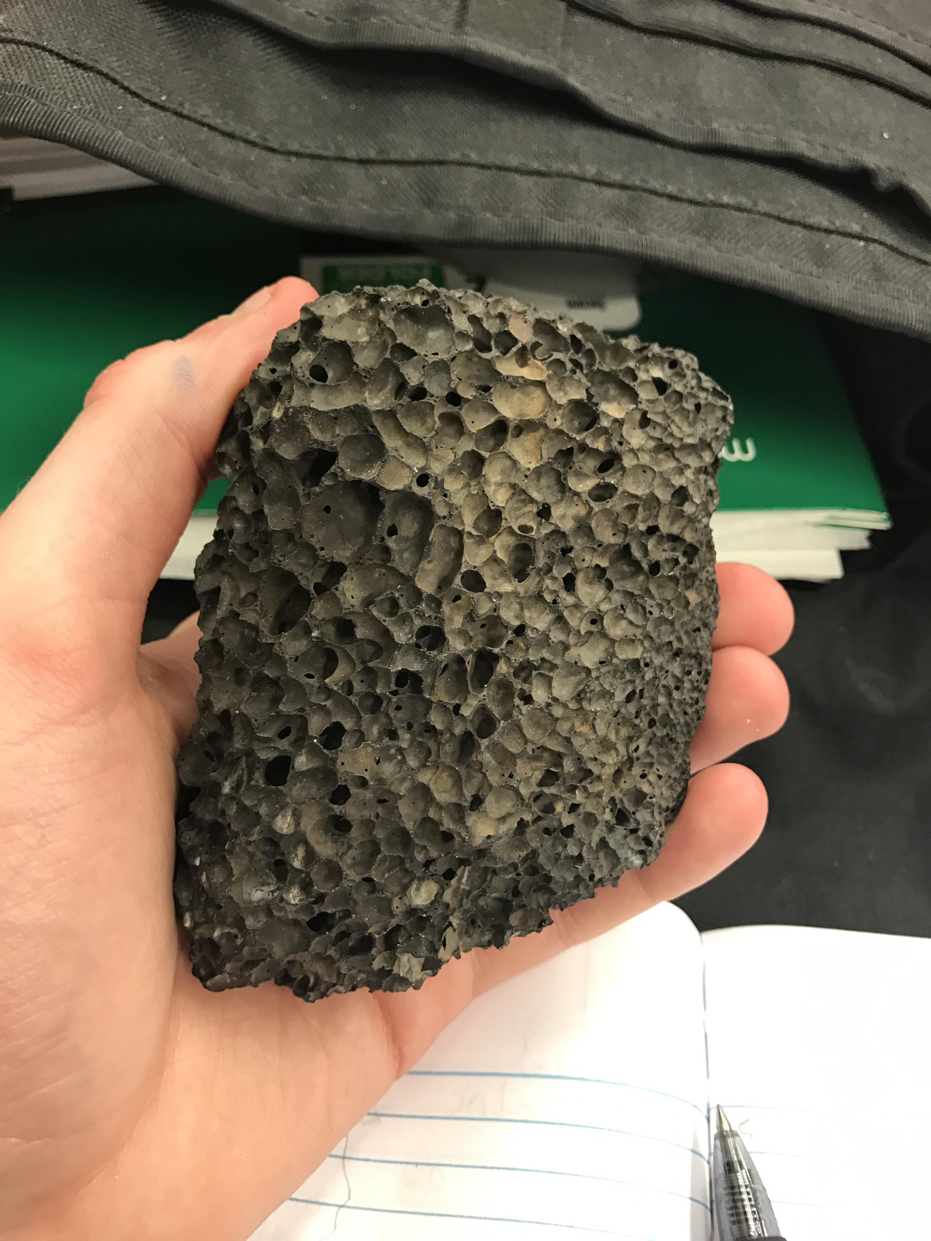 Scoria an igneous rock formed when a gas rich rich lava solidifies