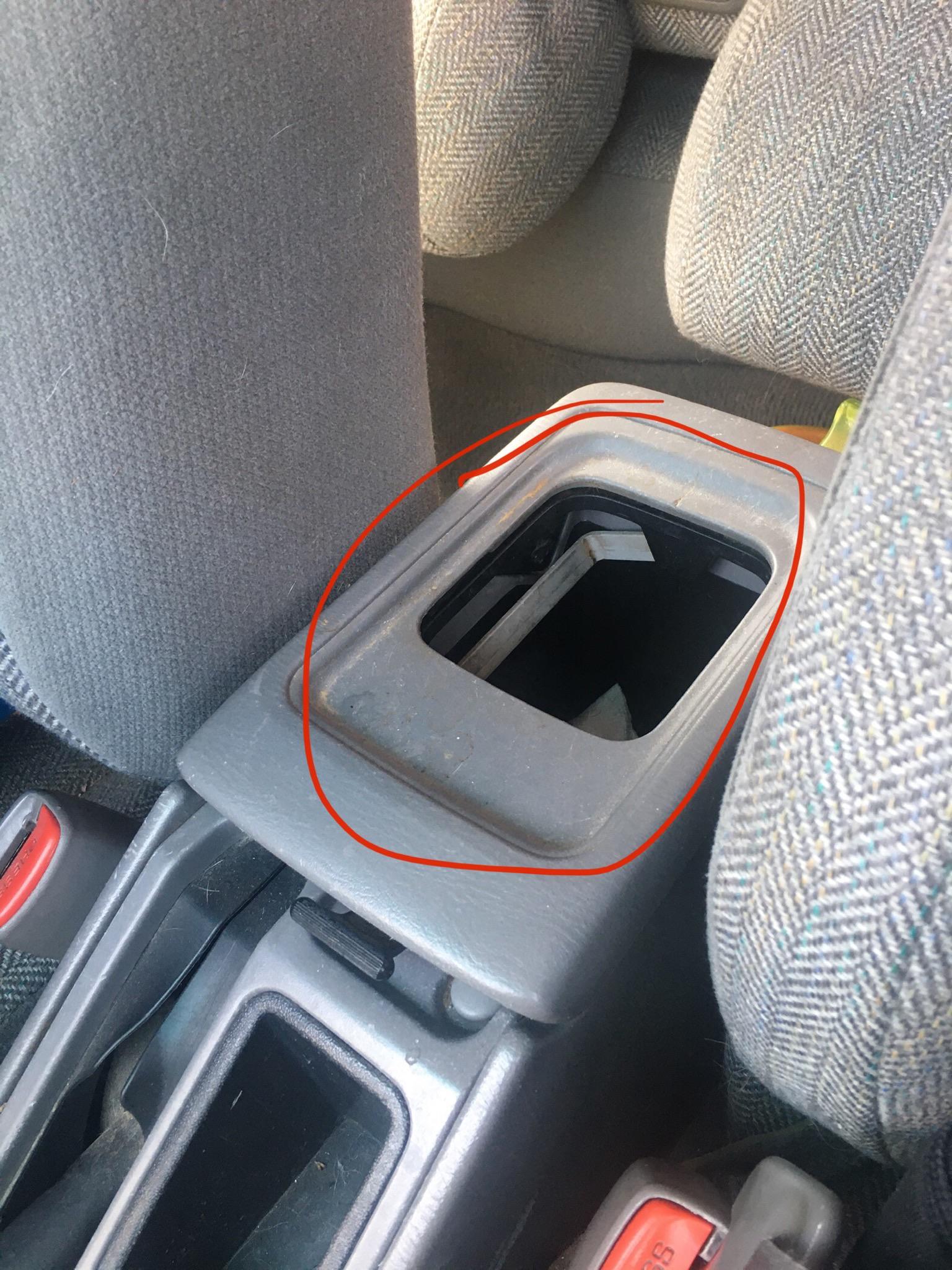 Is this part of the armrest/center console in my 2002 Forester supposed