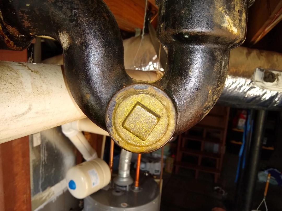 I can't unscrew this access cover to clean out the drain trap, because