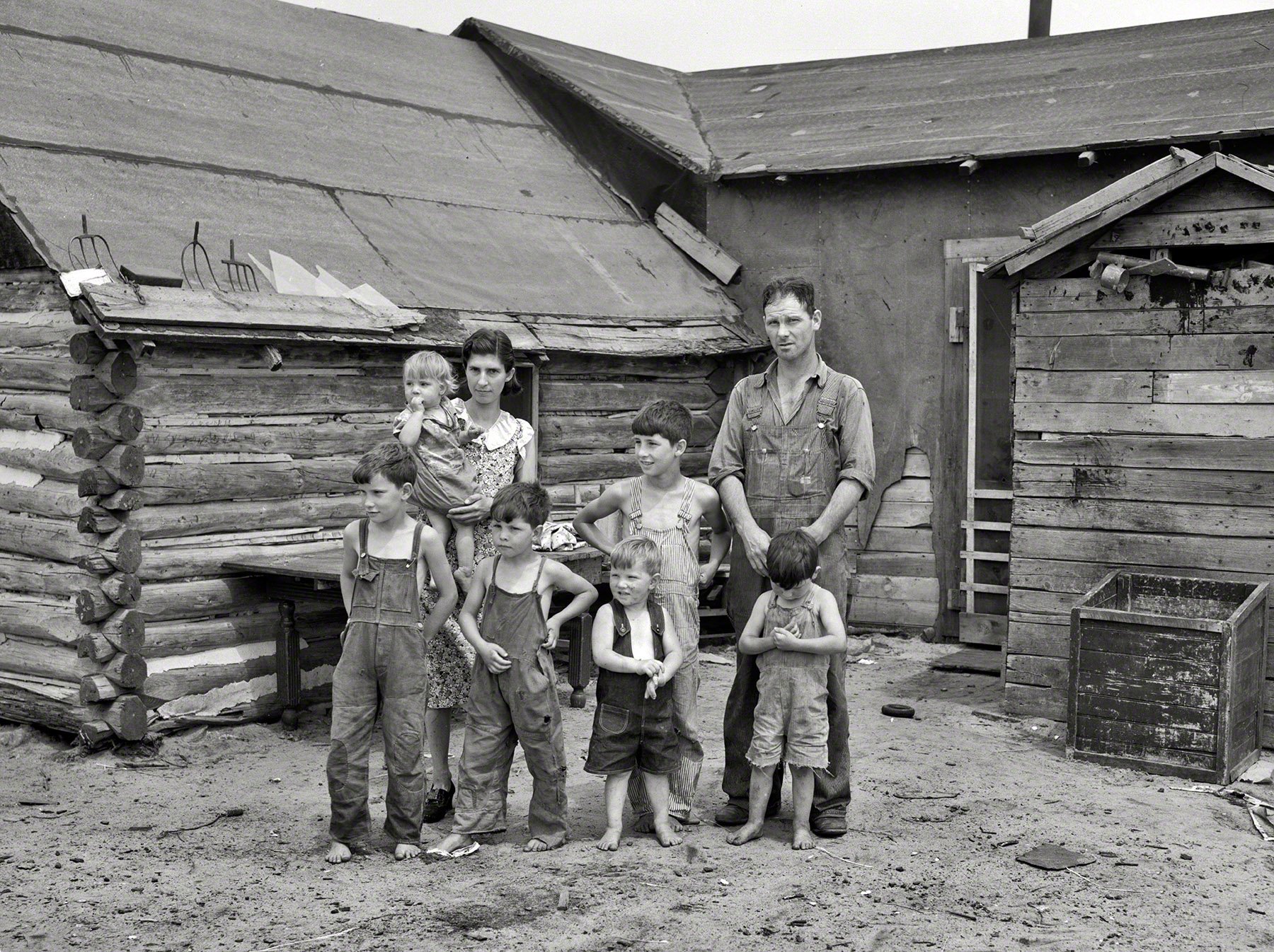 The Simplot family in front of their house near Black River Falls