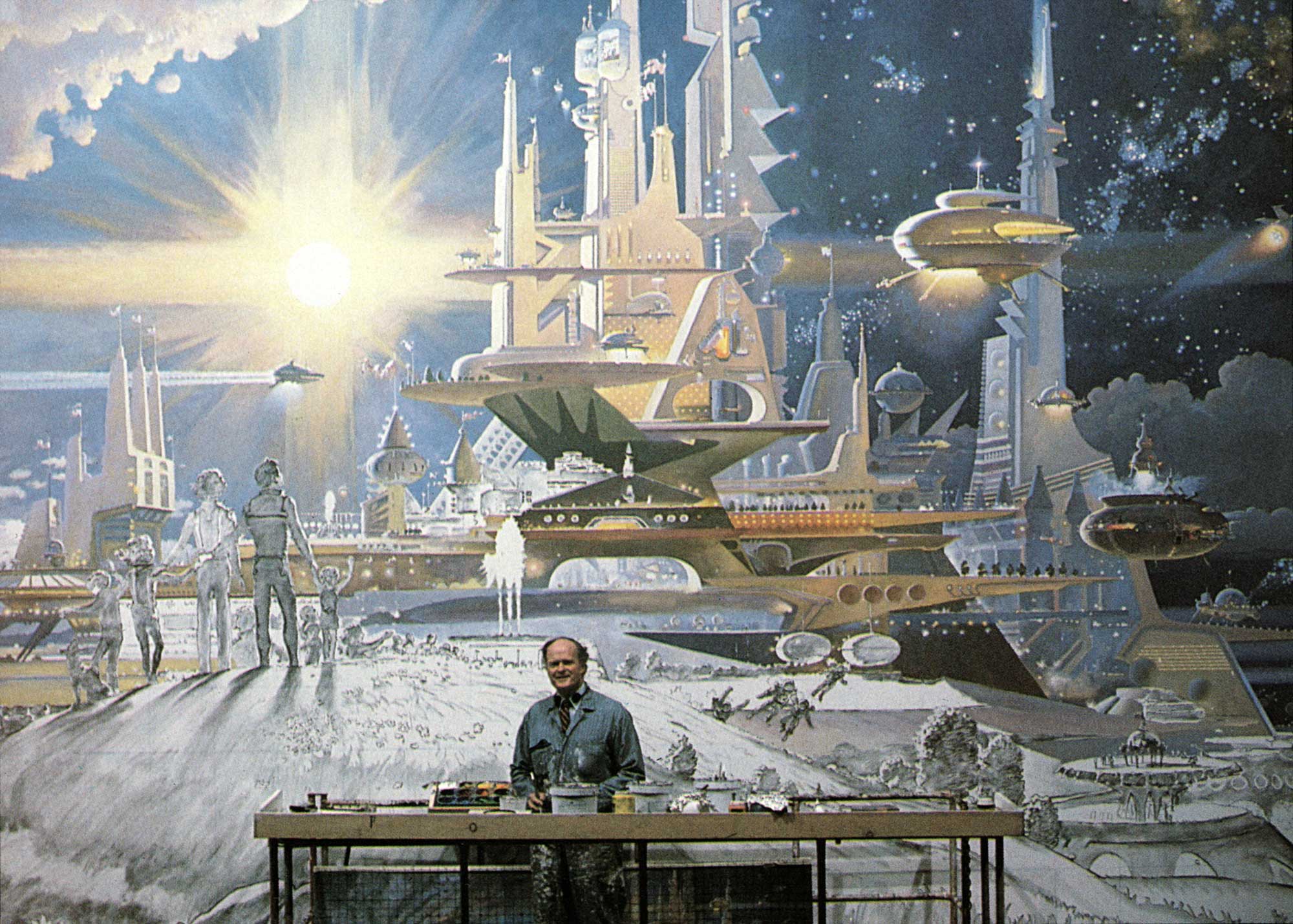 Artist Robert McCall poses in front of the nearly completed 'The