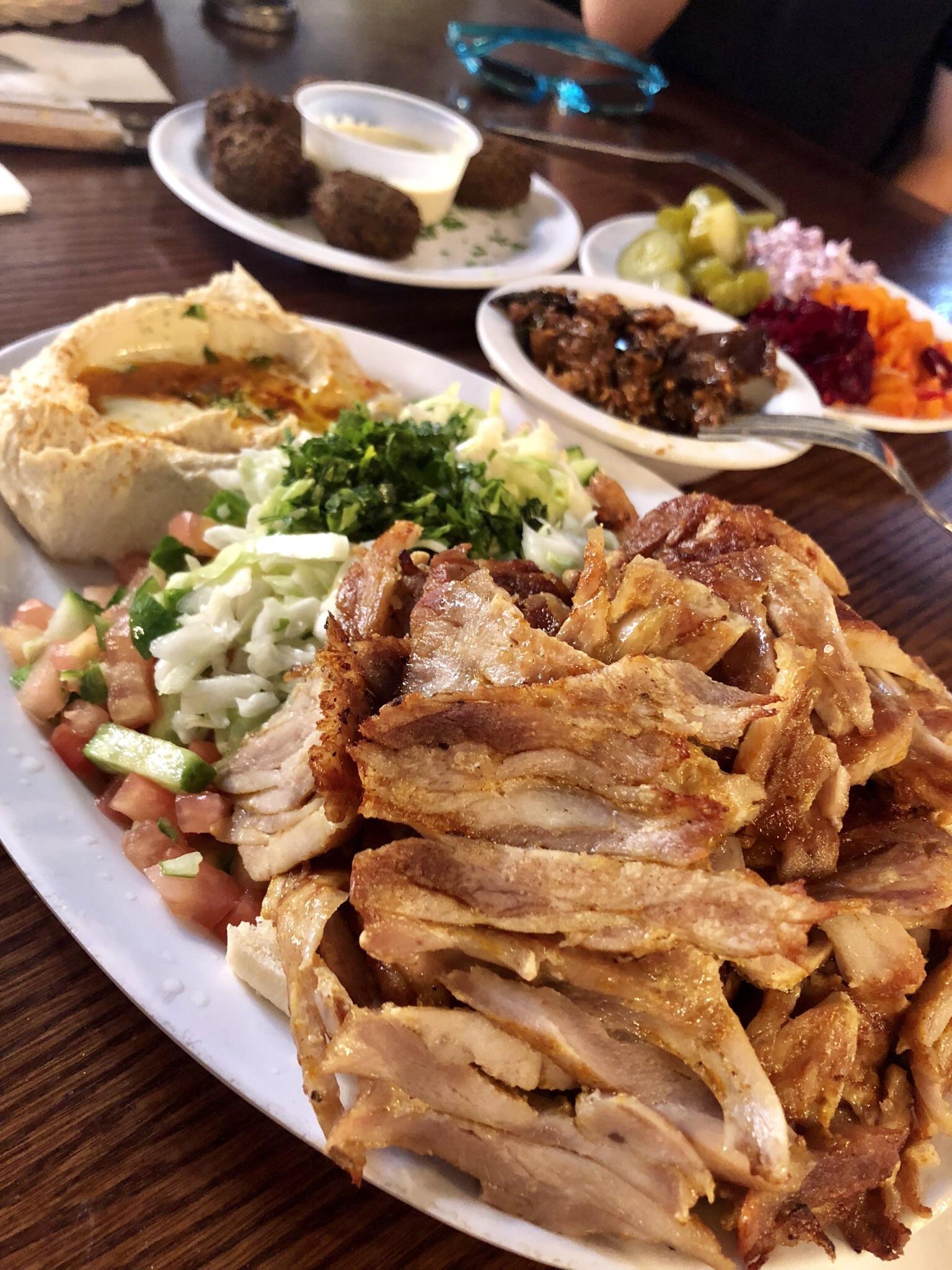 [I ate] chicken shawarma, Israeli salad, fried eggplant, hummus