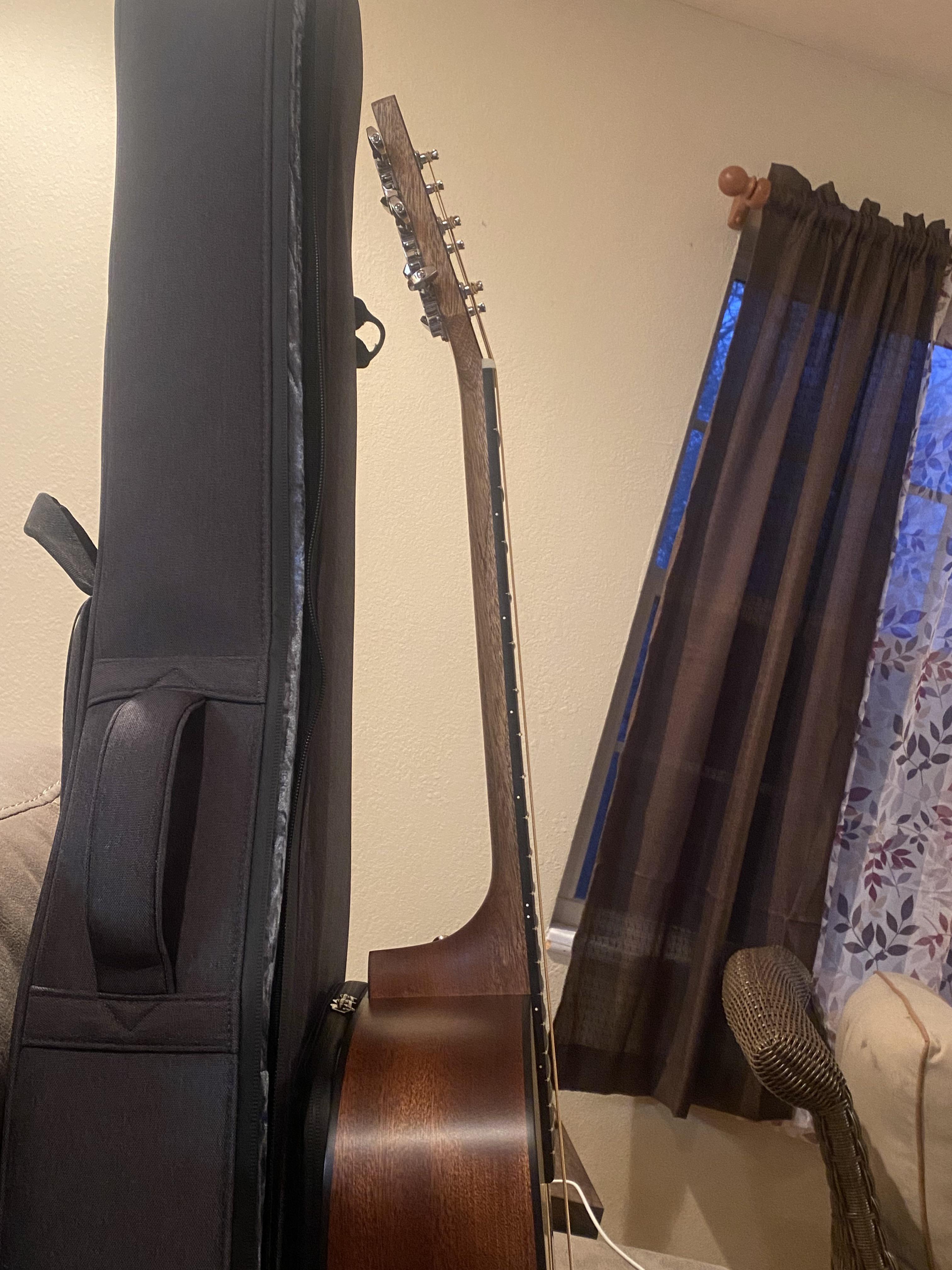 Question about fret buzz and truss rod adjustment. r/guitars