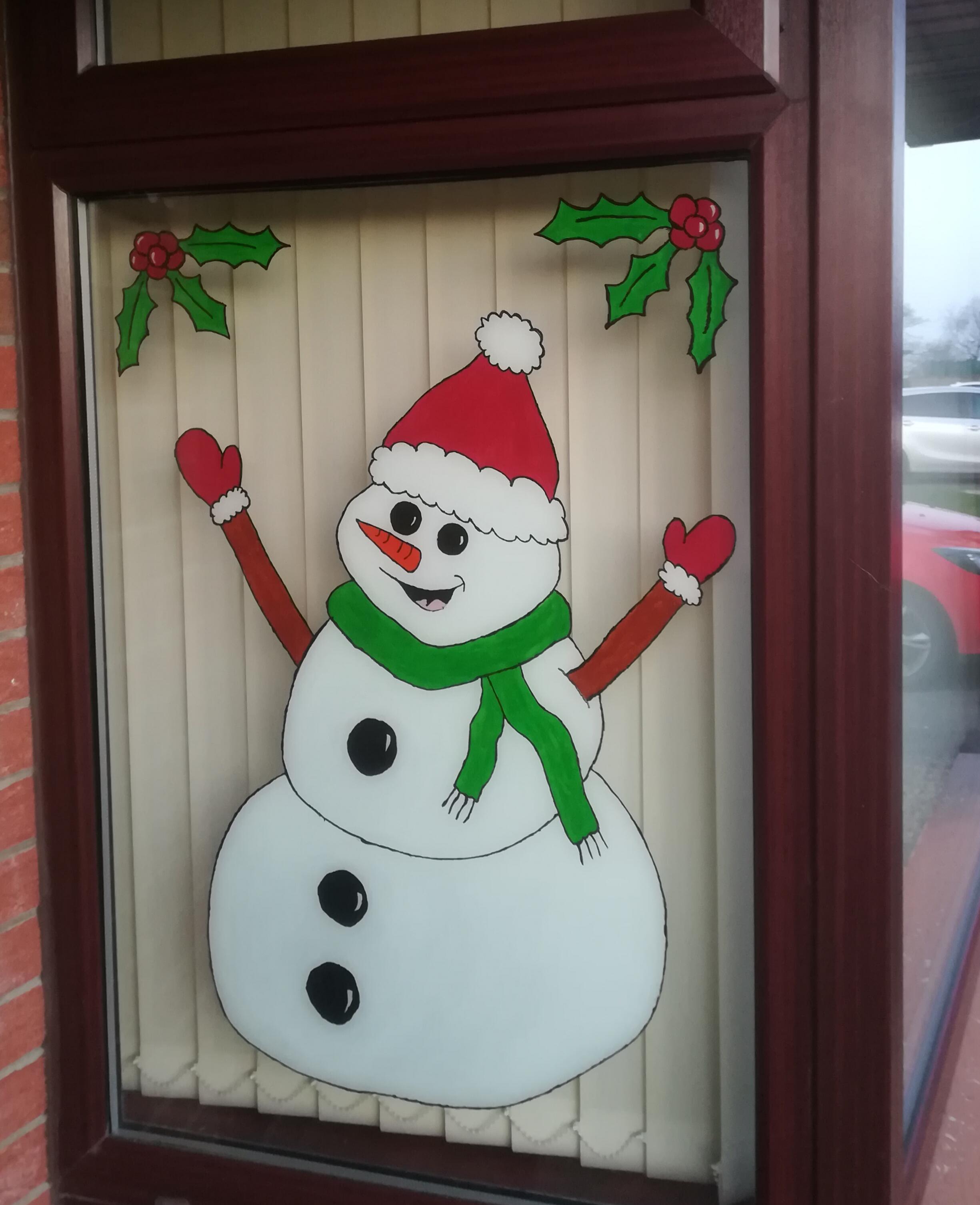 My latest Xmas window painting Christmas Snowman very proud of this