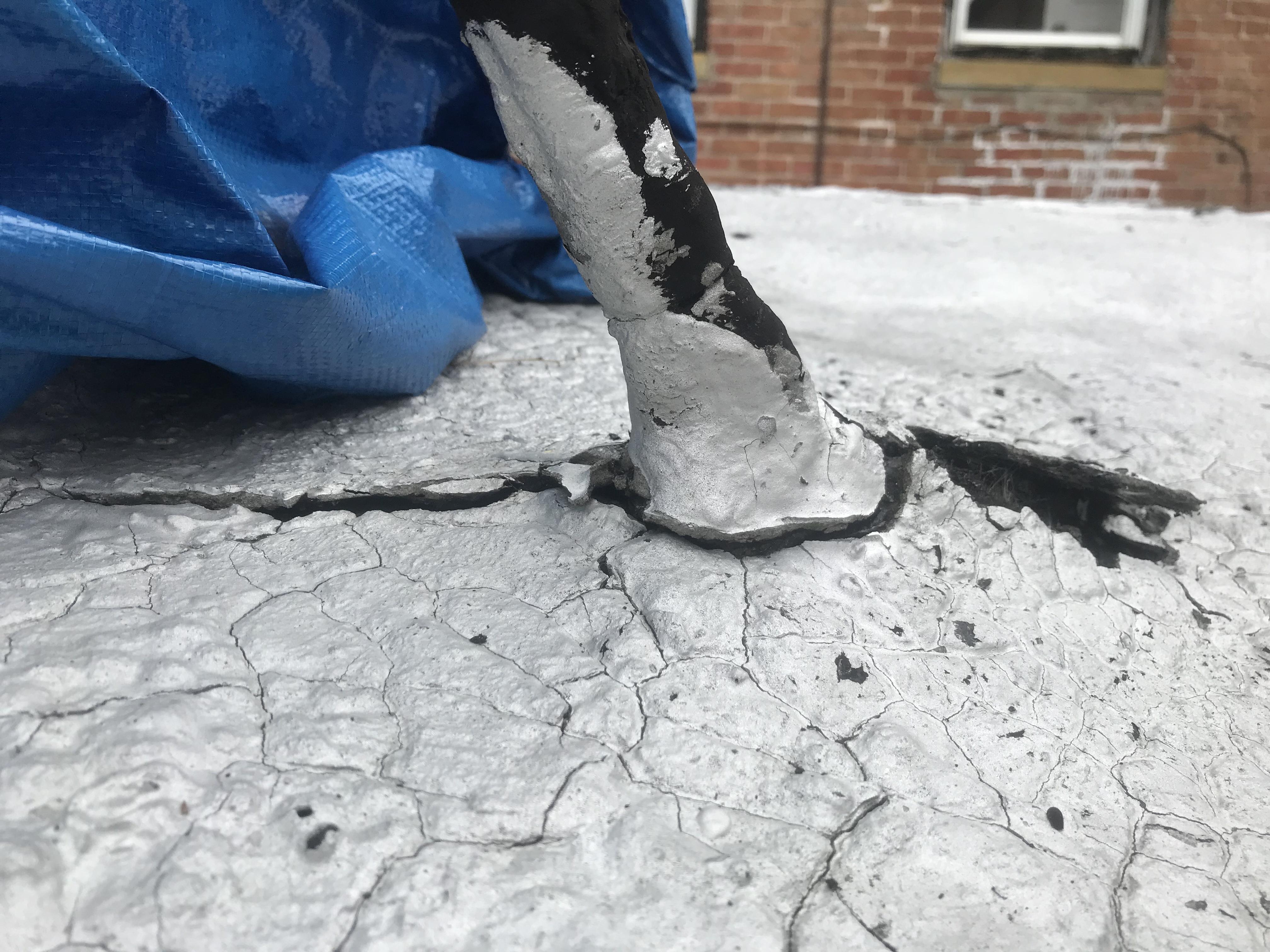 This crack just occurred on top of my tar roof. What’s a temporary