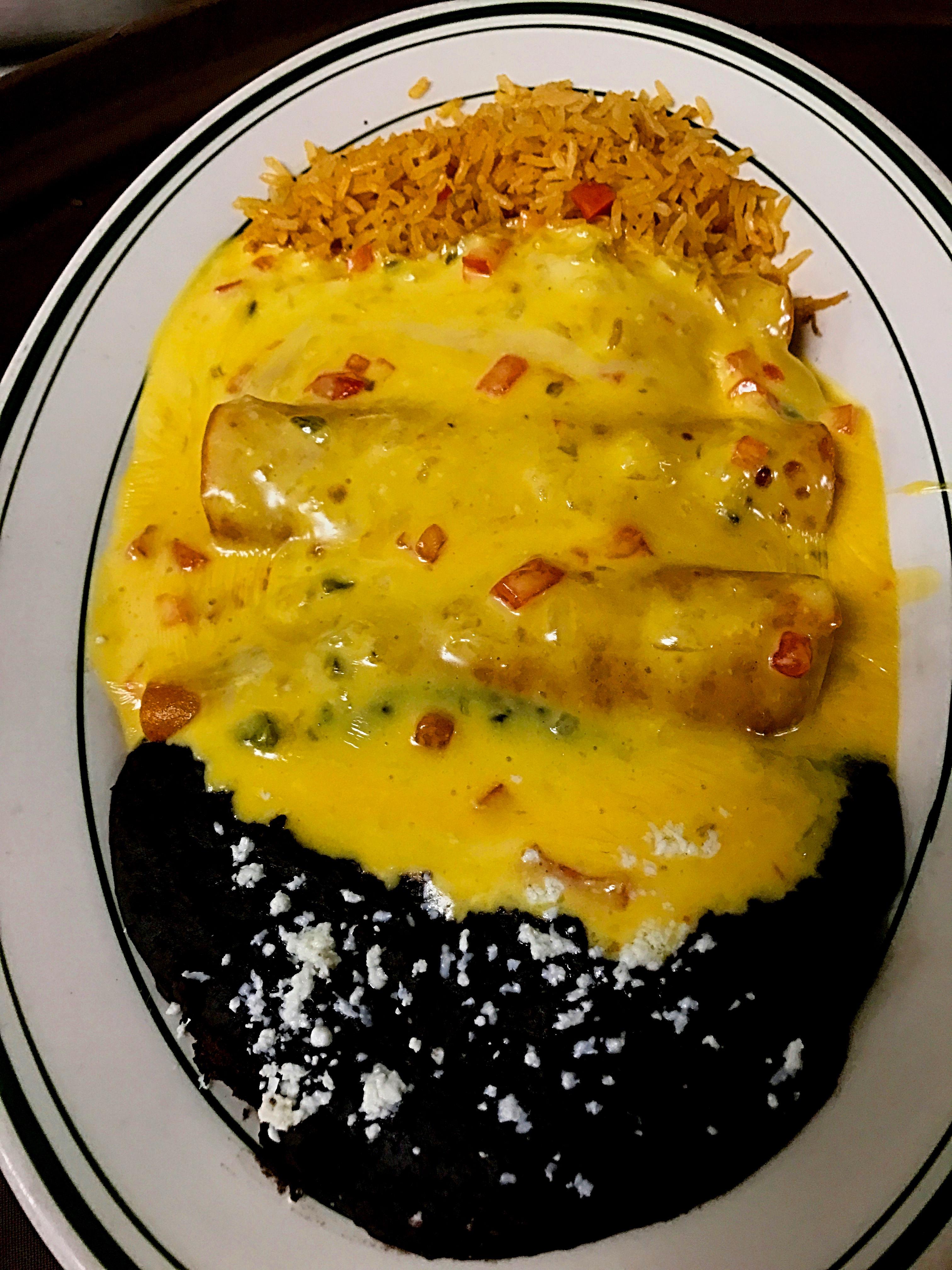[I ate] Cheese enchiladas topped with Chile con Queso r/food