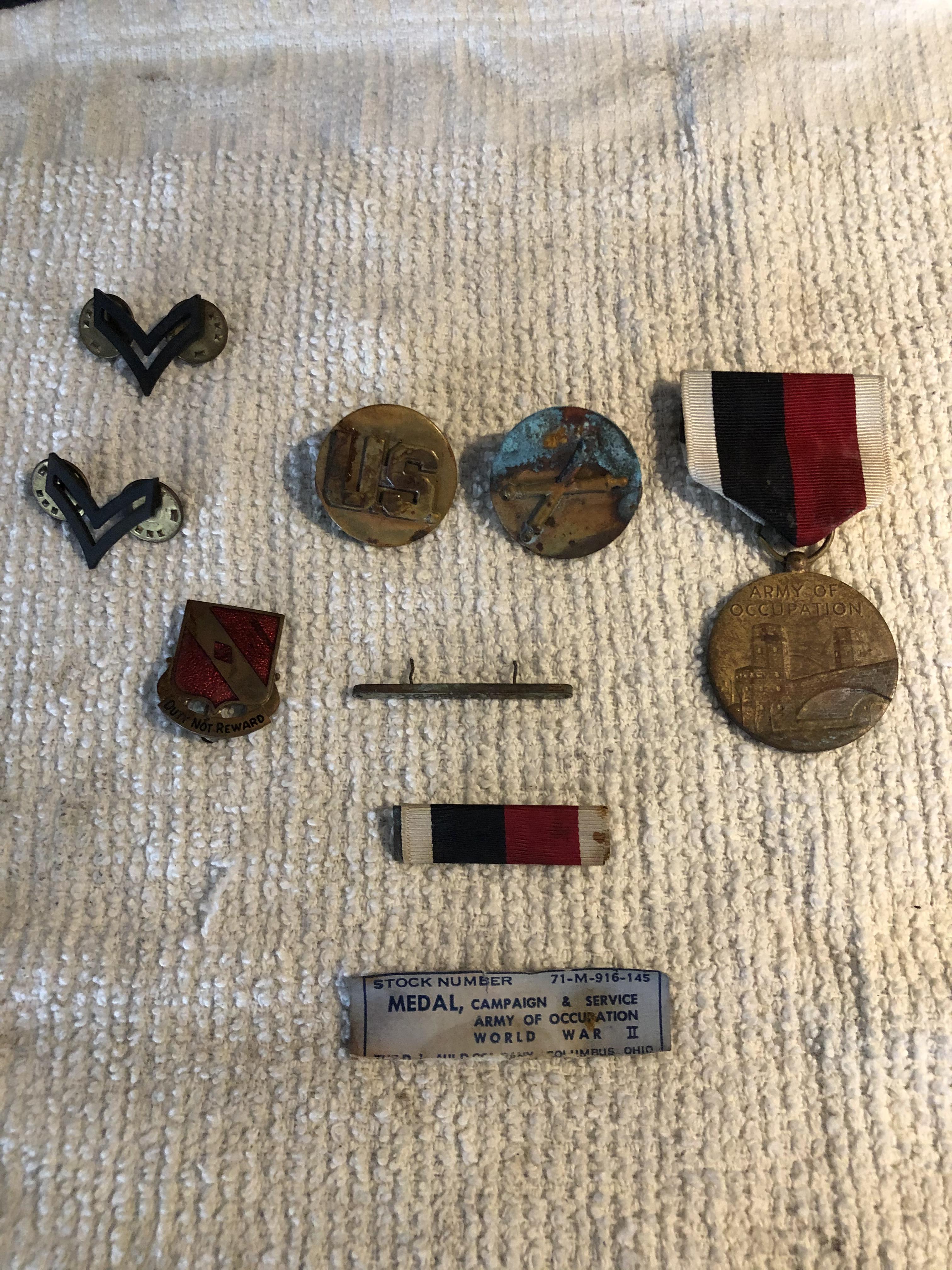 My Fathers Army medals. Anyone know what I can clean them with? r