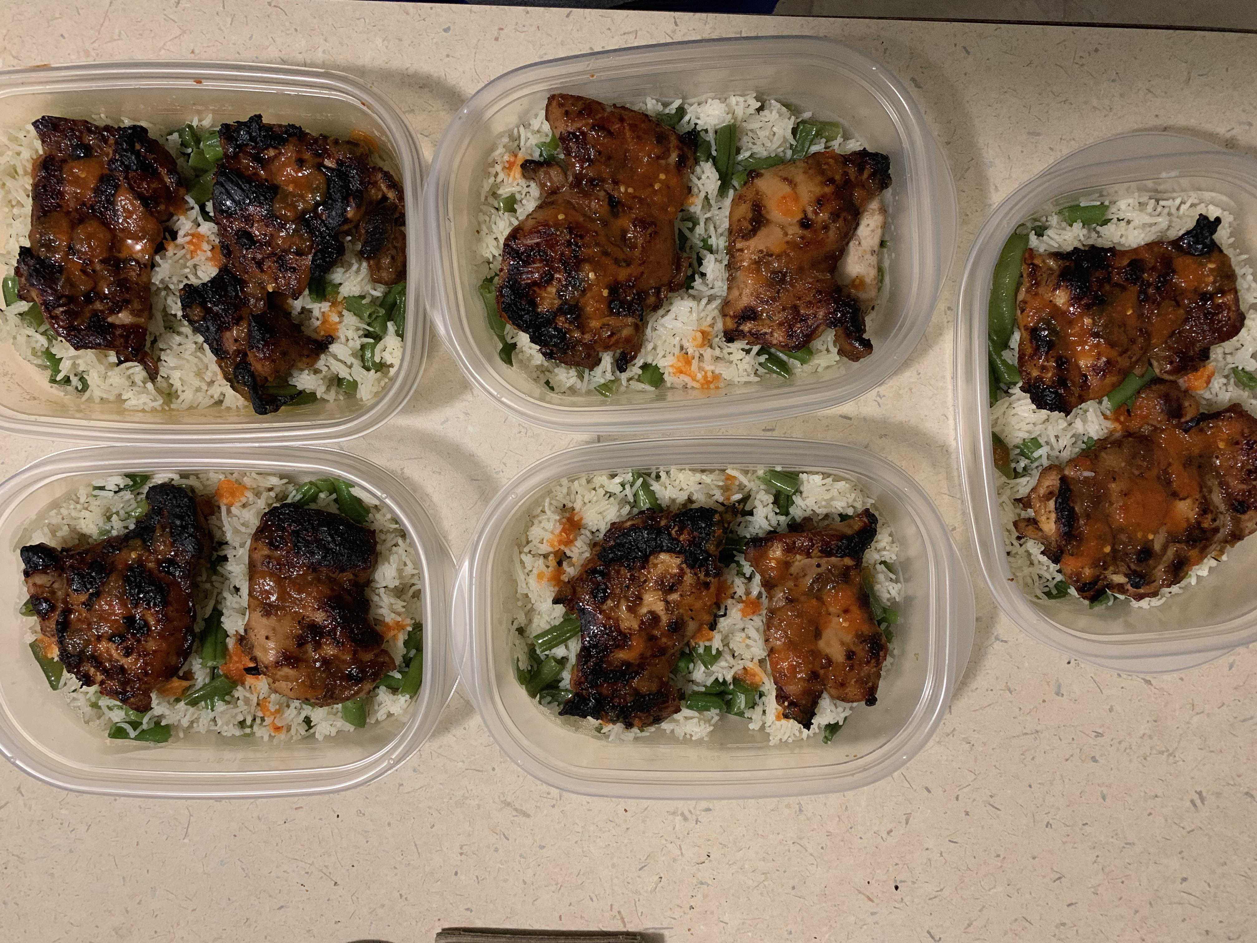 Jerk chicken thighs, basmati rice and green beans for the week. r/MealPrepSunday