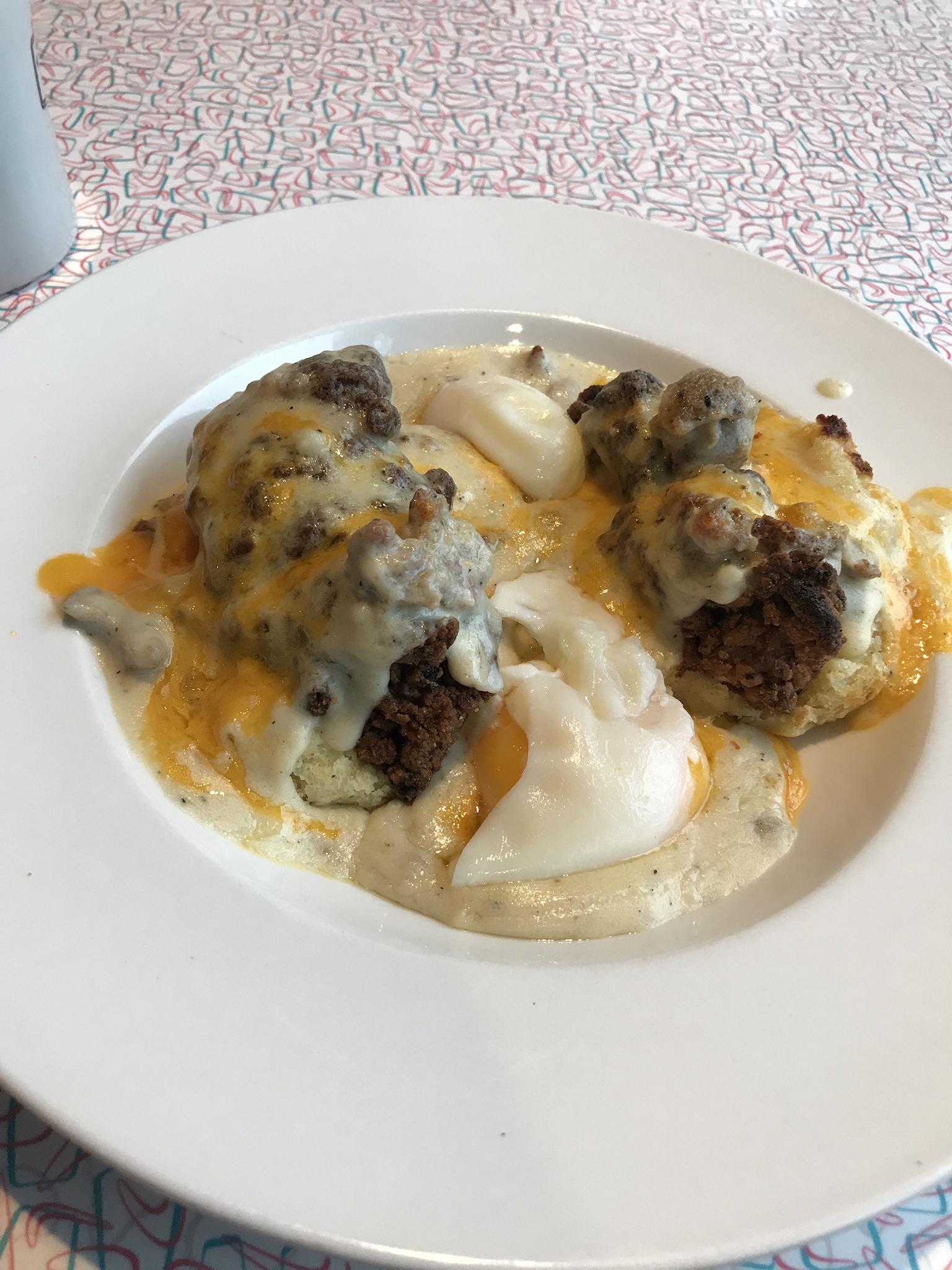 [I ate] Cathead Fried Chicken + Biscuits in Sausage Gravy + Poached Eggs Big Bad Breakfast in