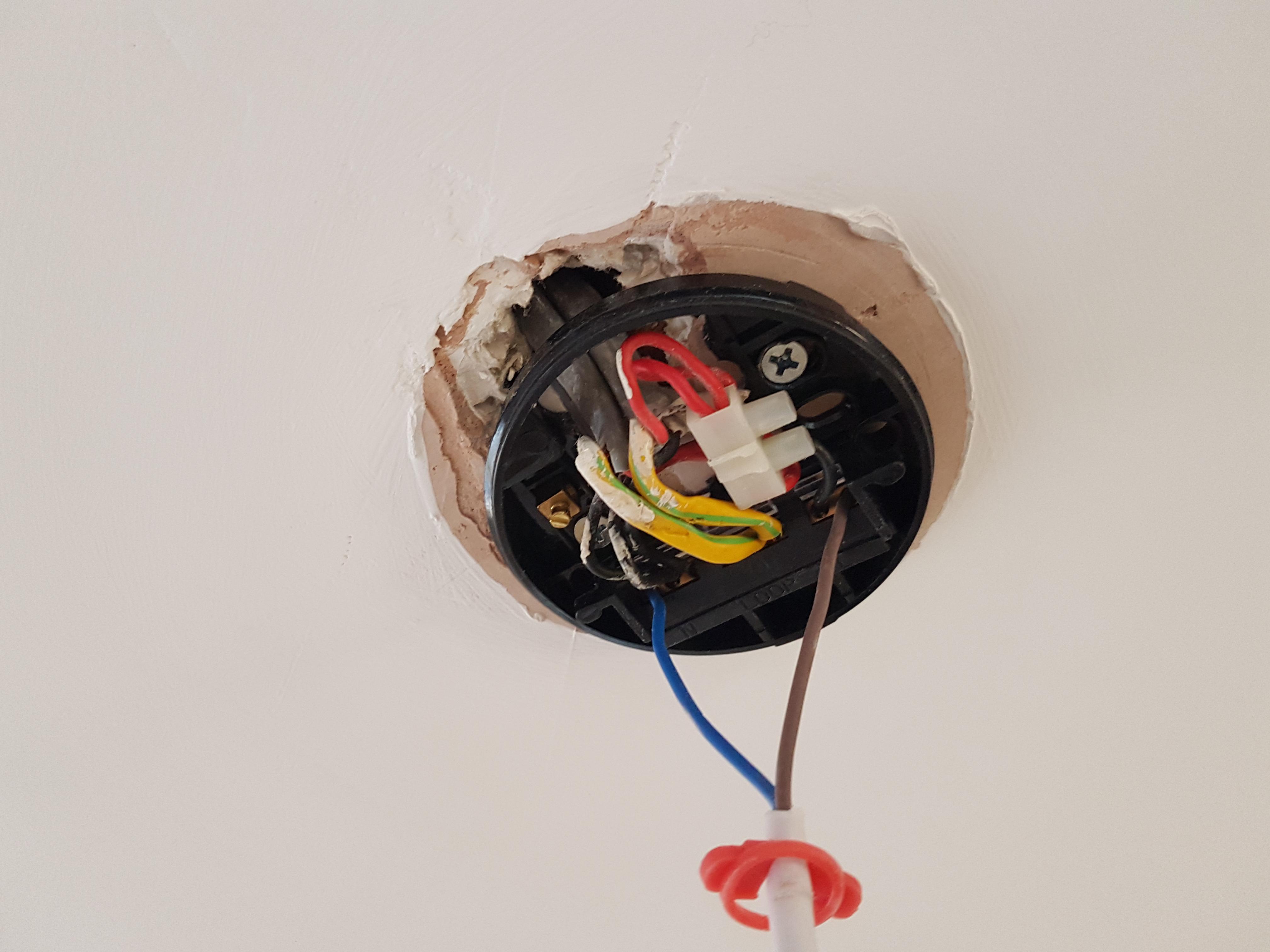 Best way to fill/cover this hole around a ceiling downlight before