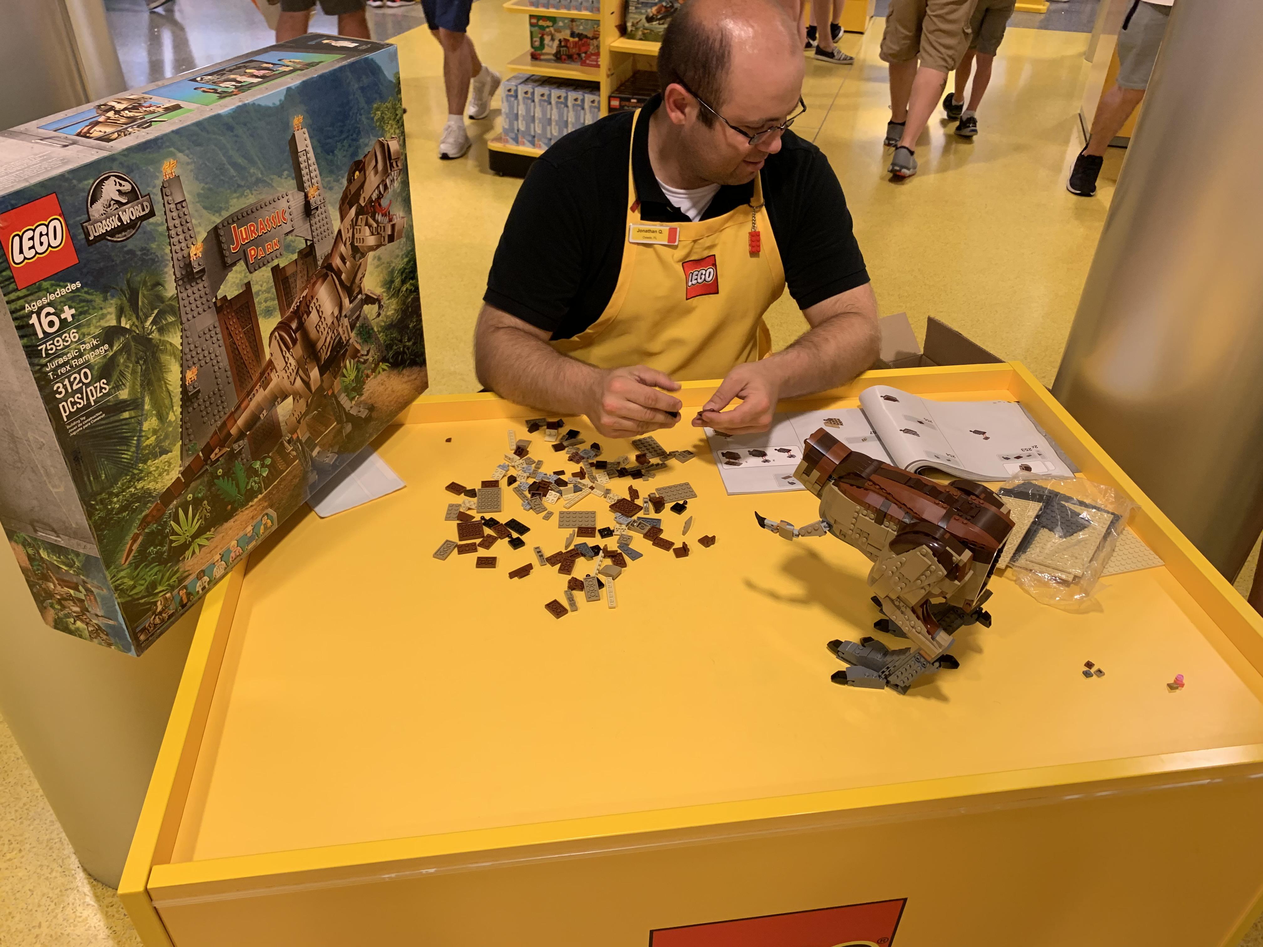 Disney Springs LEGO store employee putting together tomorrow's release