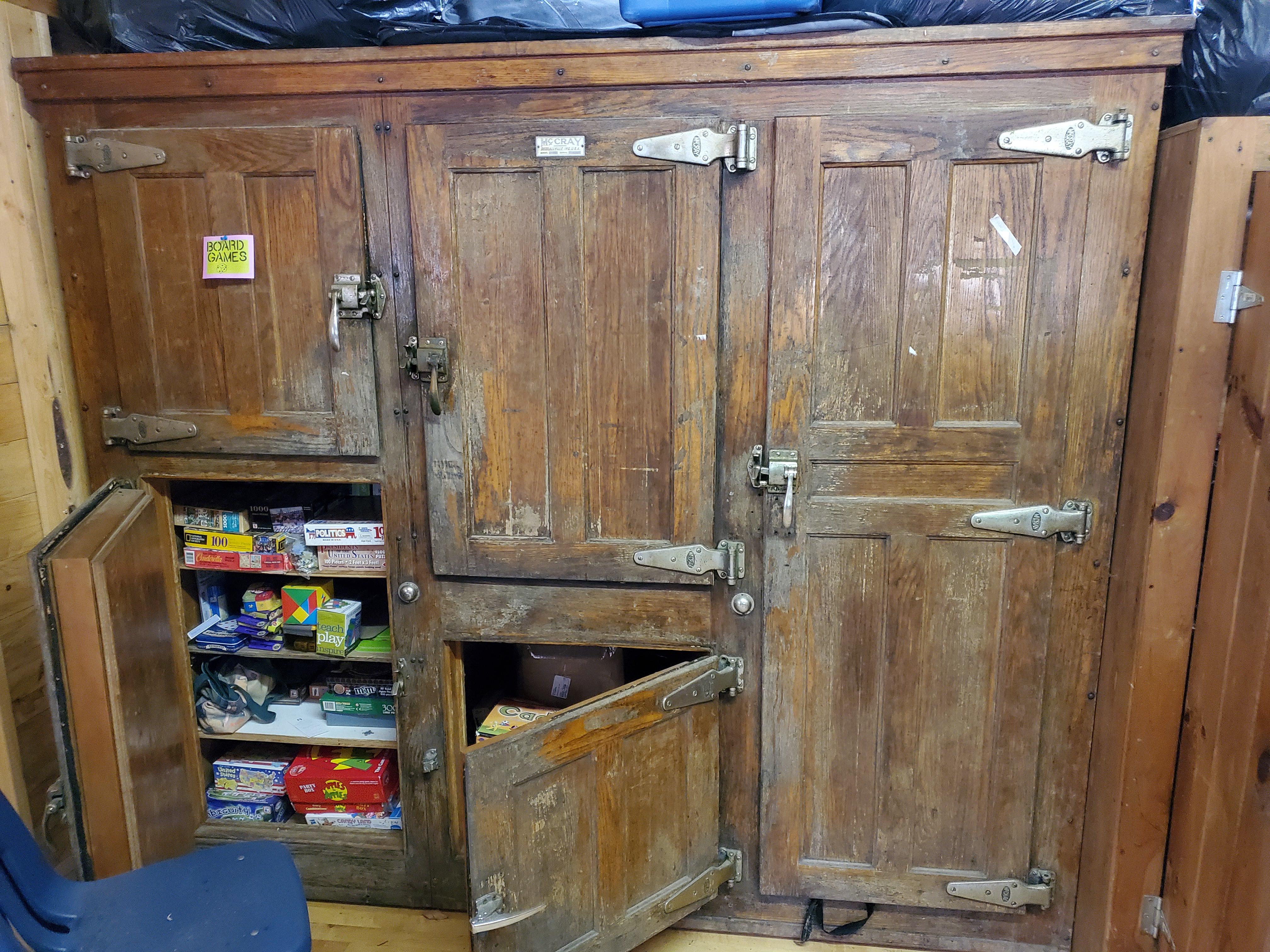 My camp used their old wooden fridges to store games and costumes r