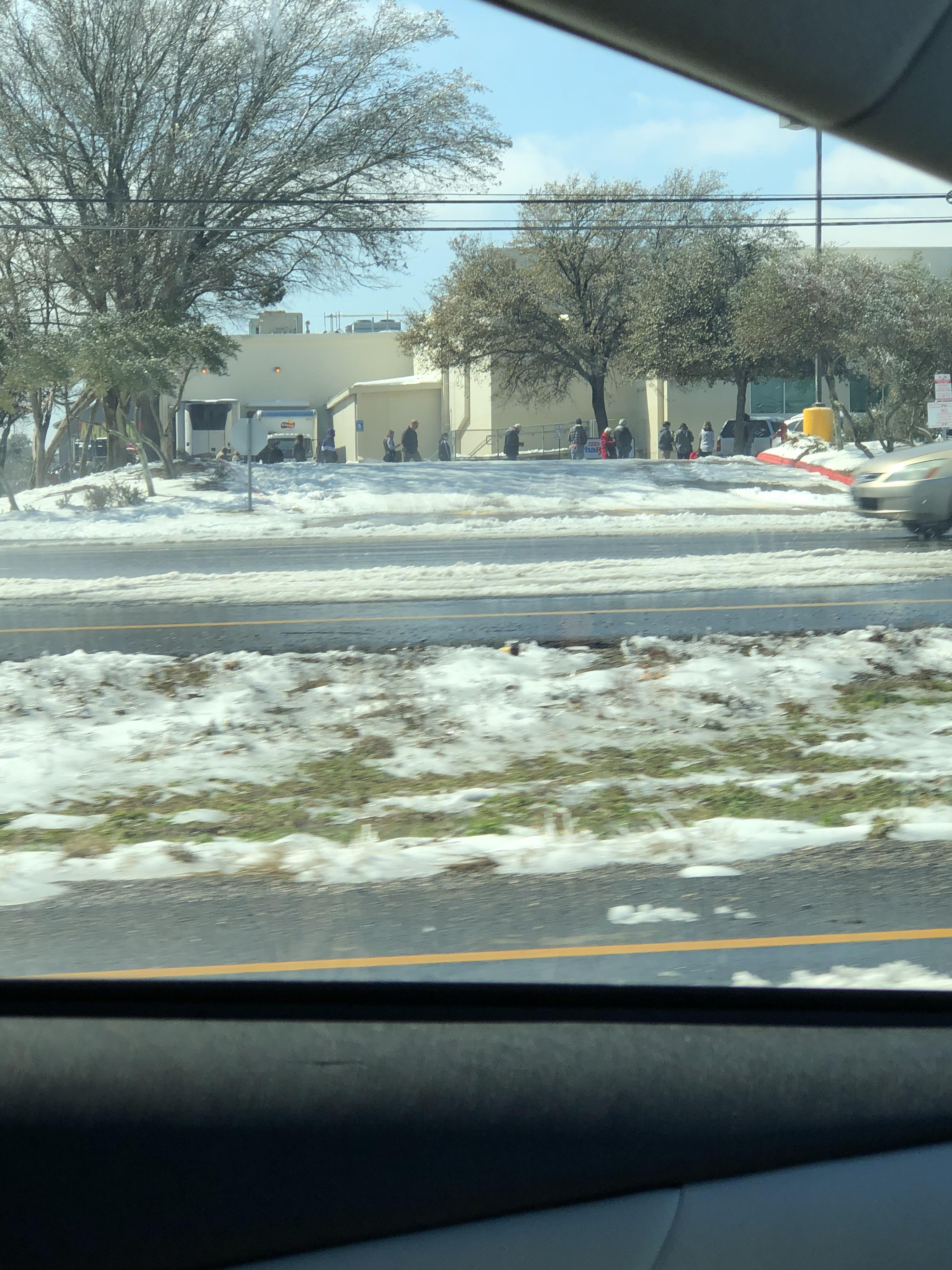 Zoom in. HEB Parmer and McNeil line is wrapped completely around the