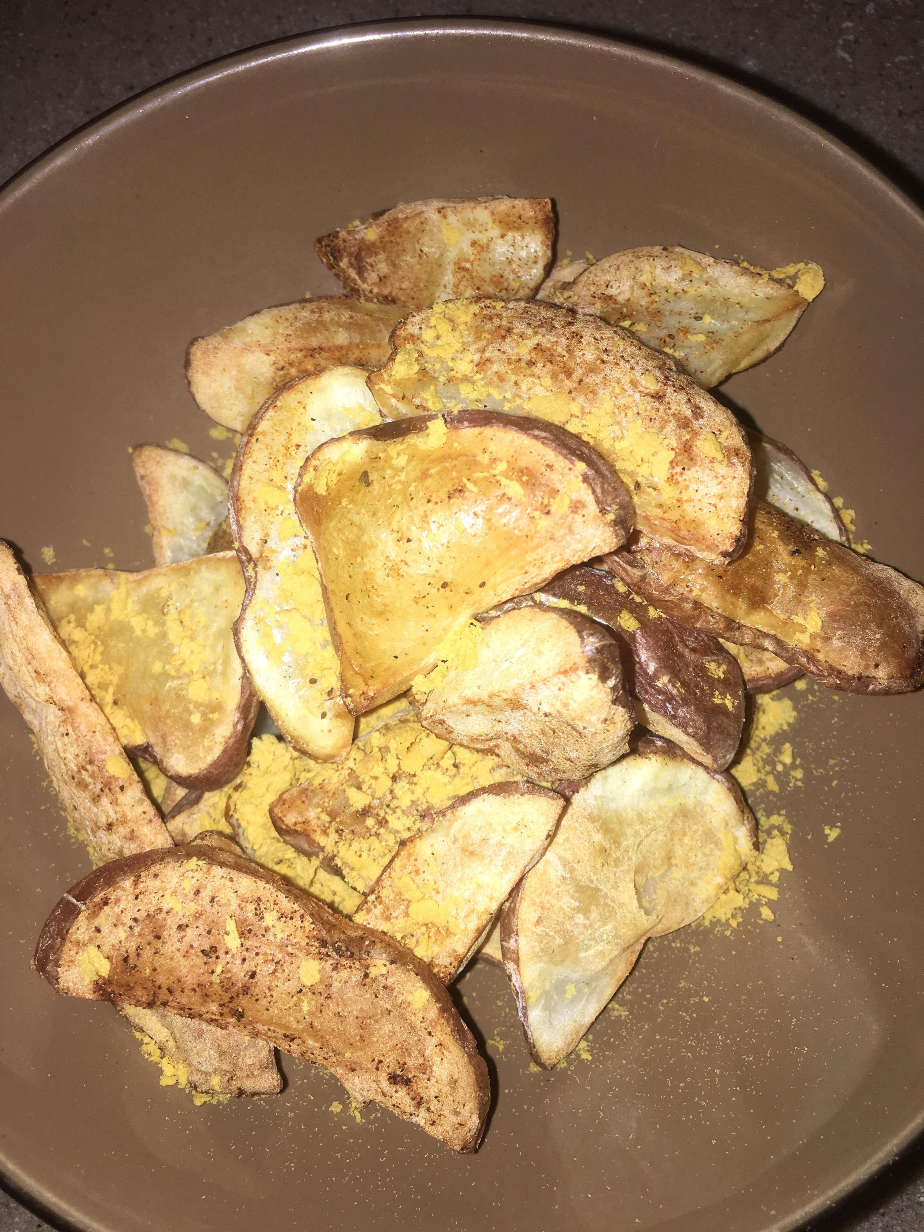 Air fried potatoes with some nooch and seasonings r/ShittyVeganFoodPorn