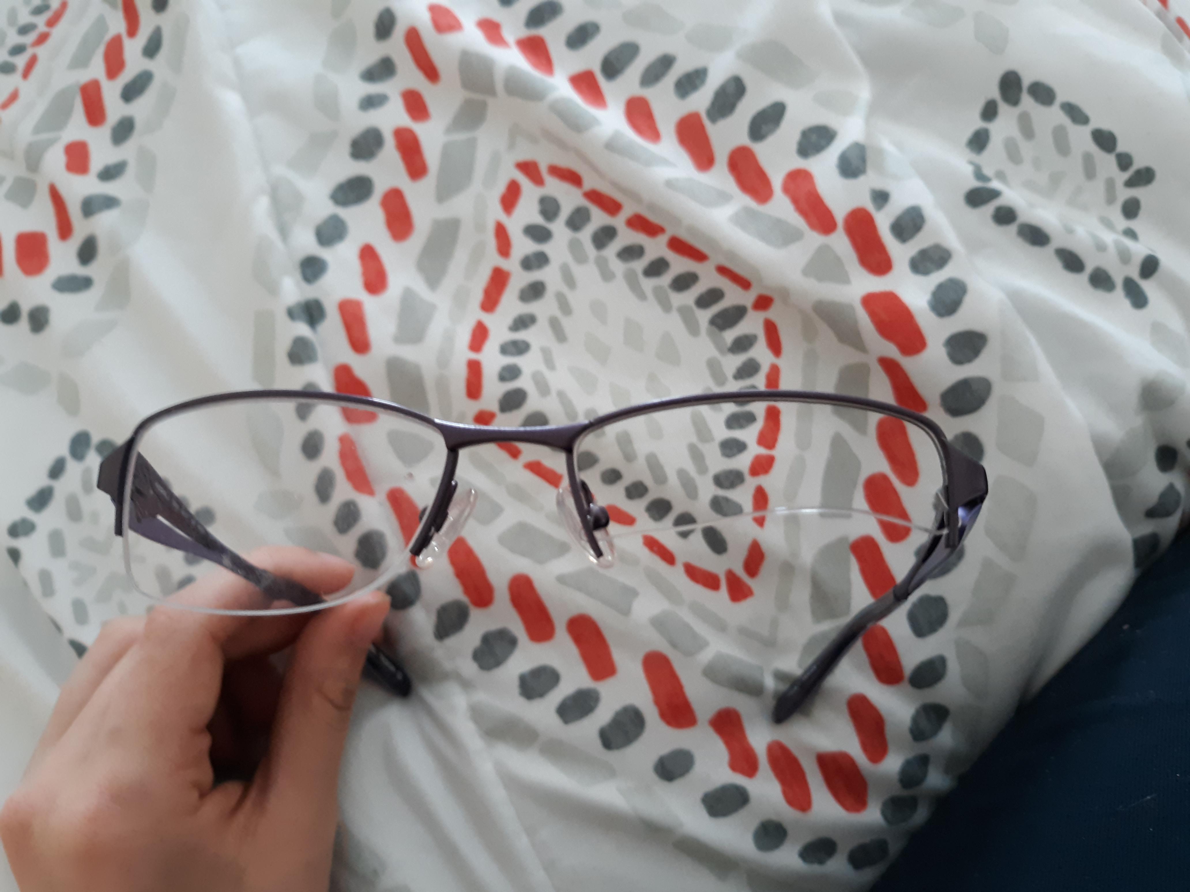 One of the lenses popped out of my glasses. Can I fix it? r/glasses