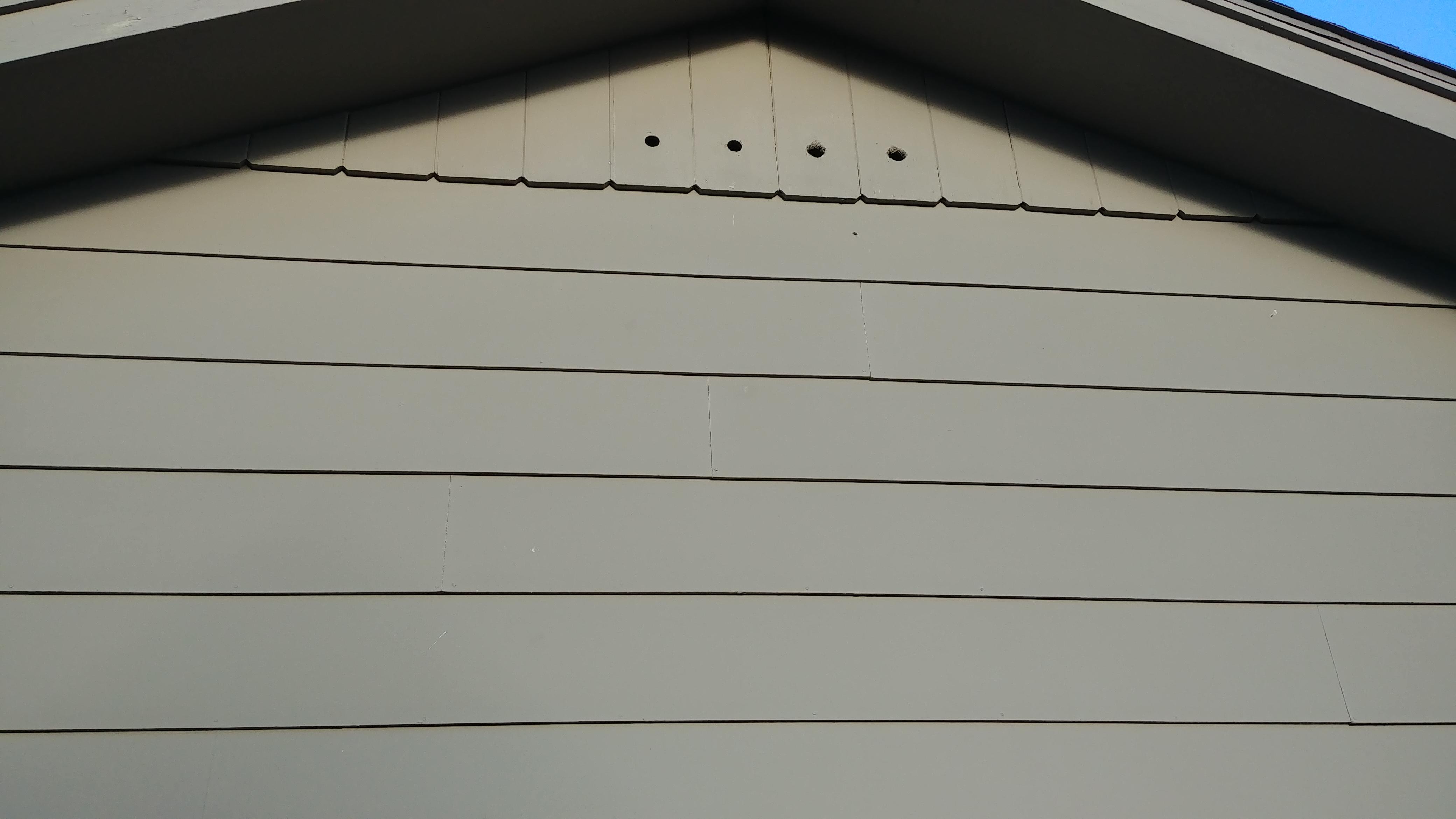 Why are these holes on the sides of some houses? What could they