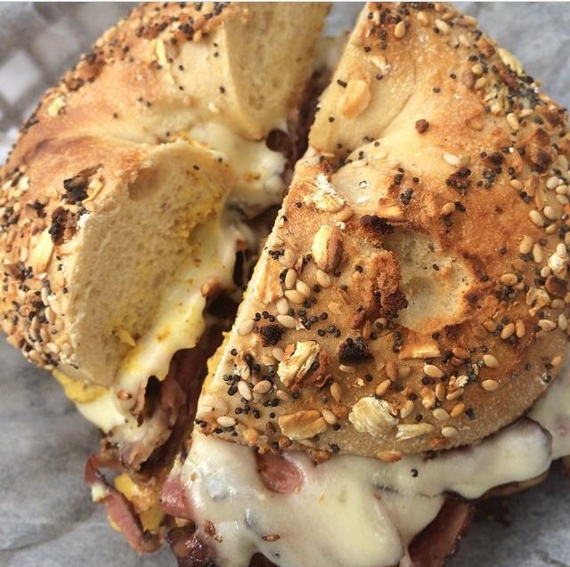 Pastrami egg and cheese everything bagel with spicy mustard. From Stein