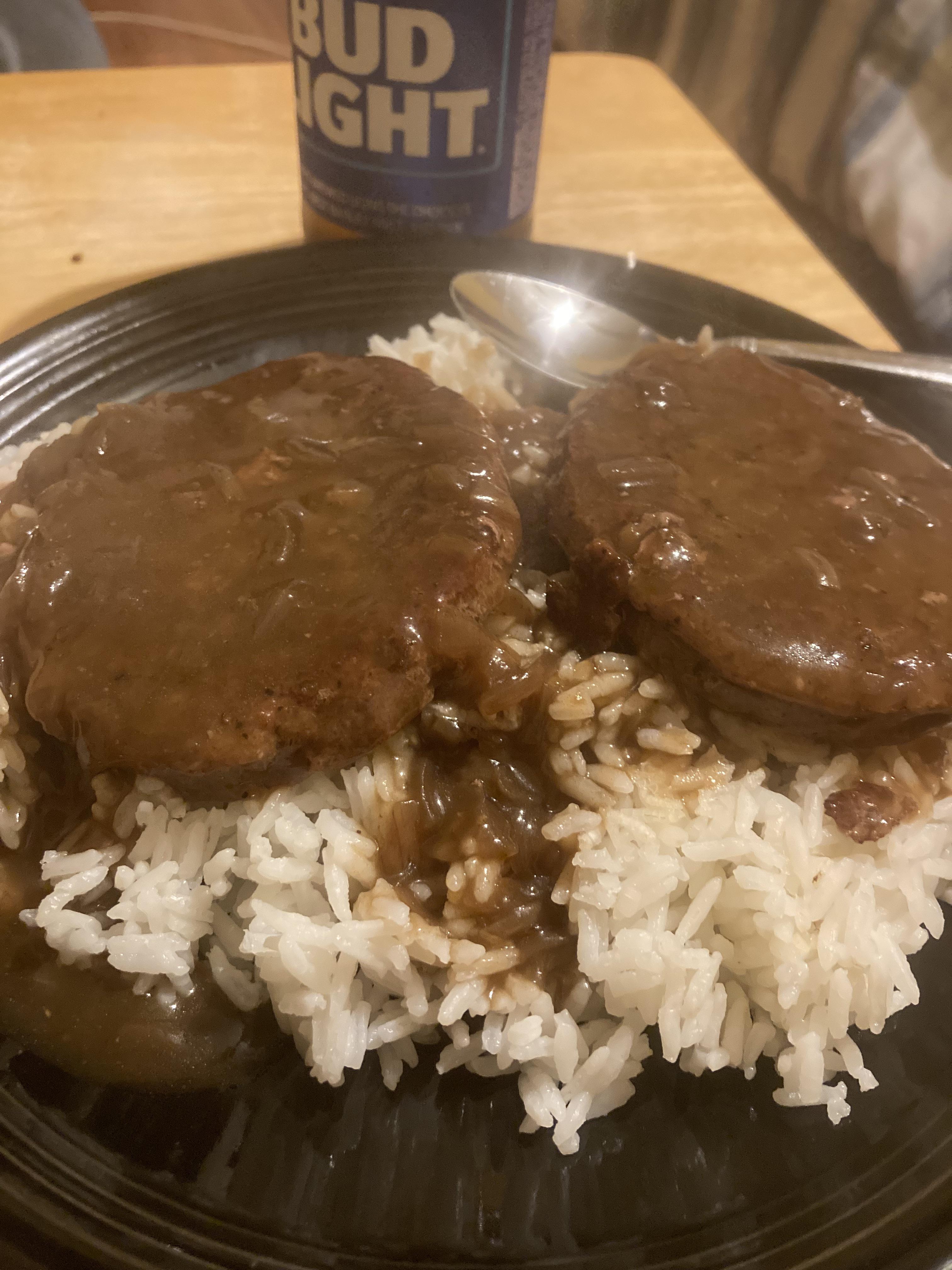 Walmart frozen hamburger patties, with great value gravy, and RICE. and