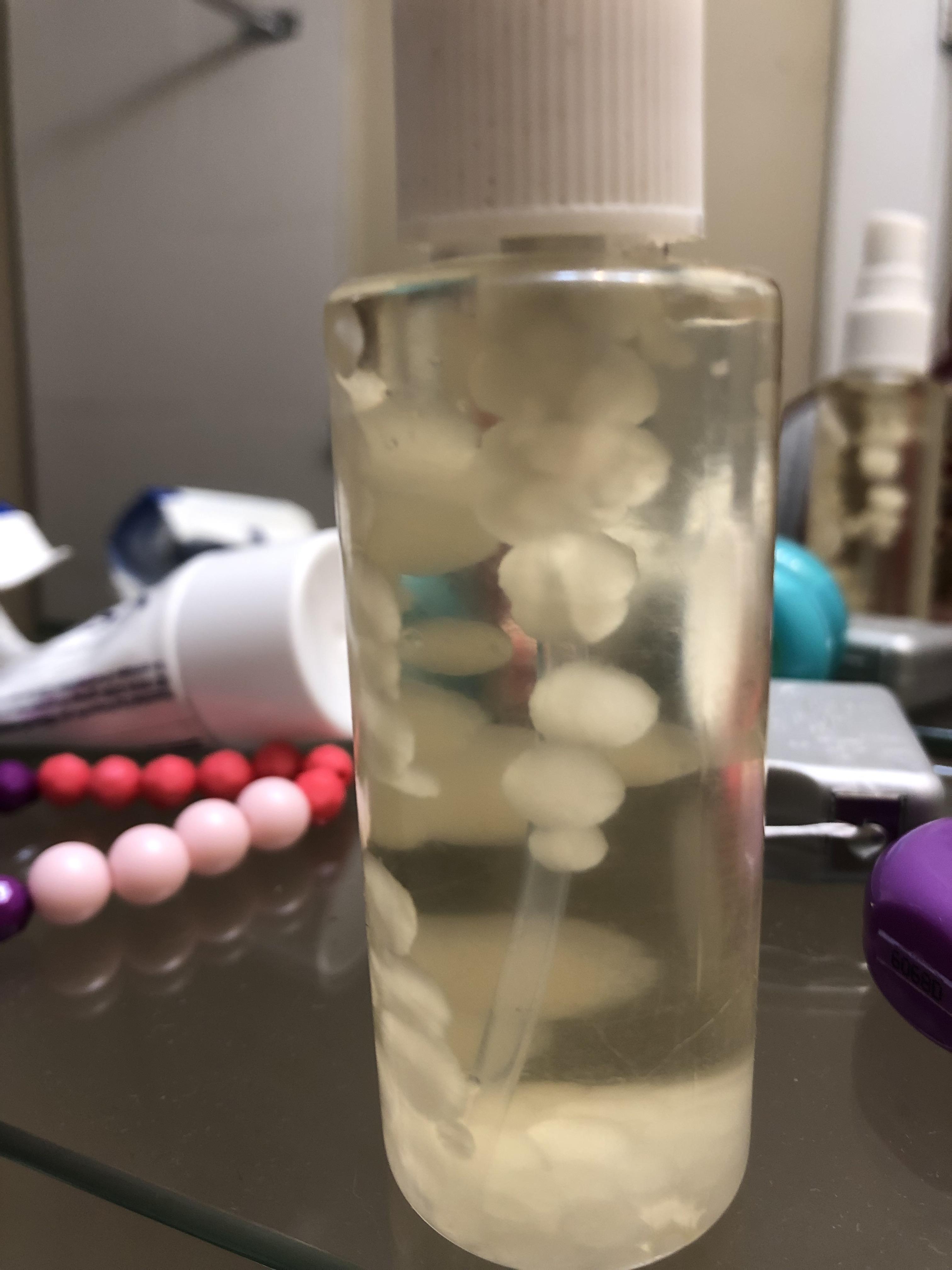 I put coconut oil in my spray bottle and hoped it would stay liquid but