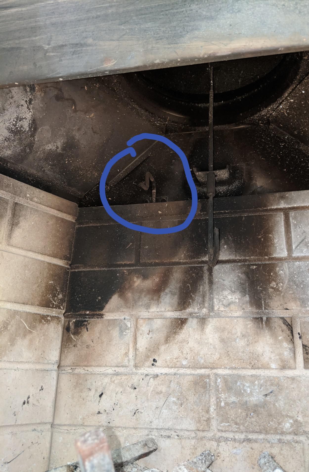 Anyone have a clue?? Back of fireplace r/whatisthisthing