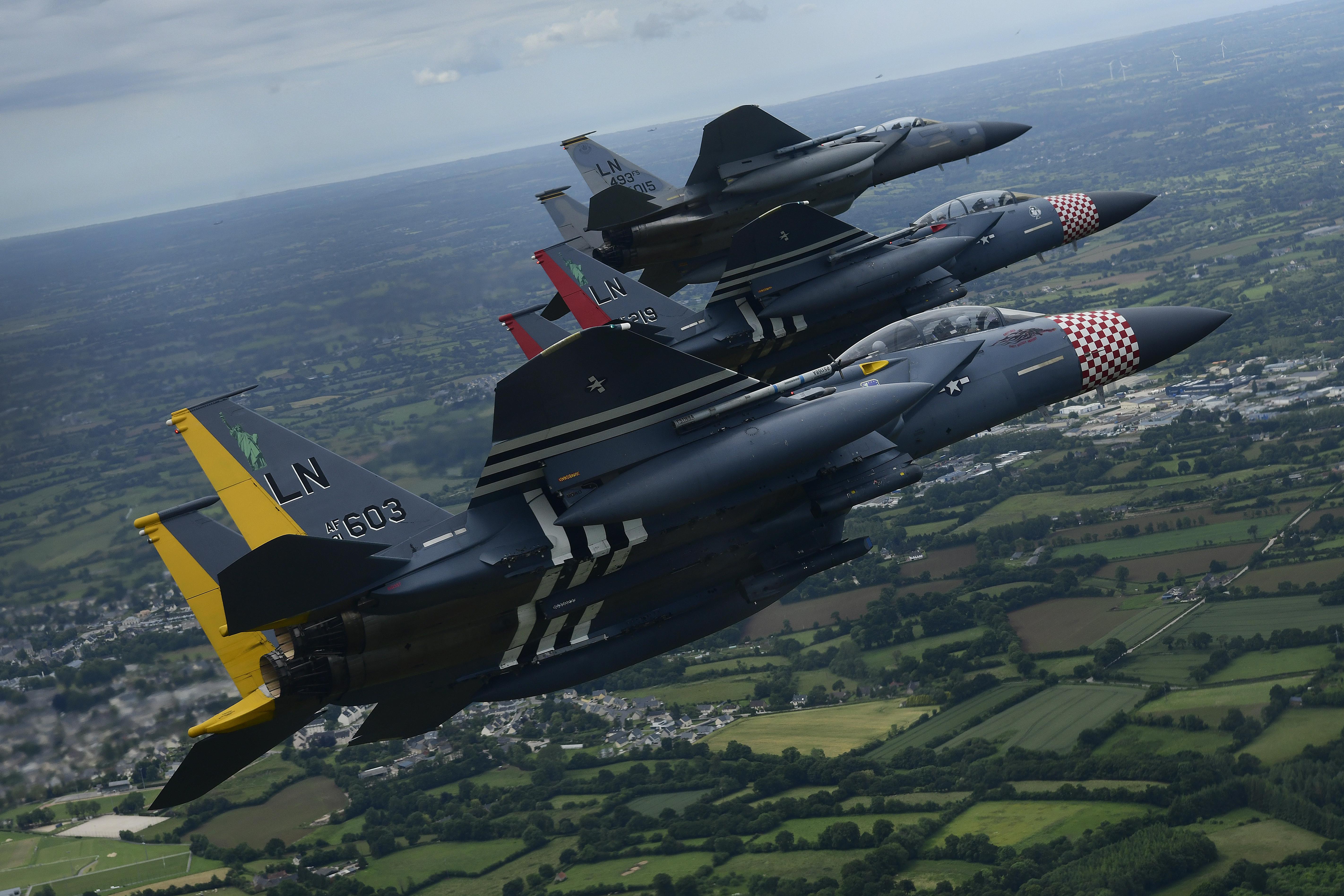 F15E Strike Eagle pair in heritage paint scheme, fly with an F15C in