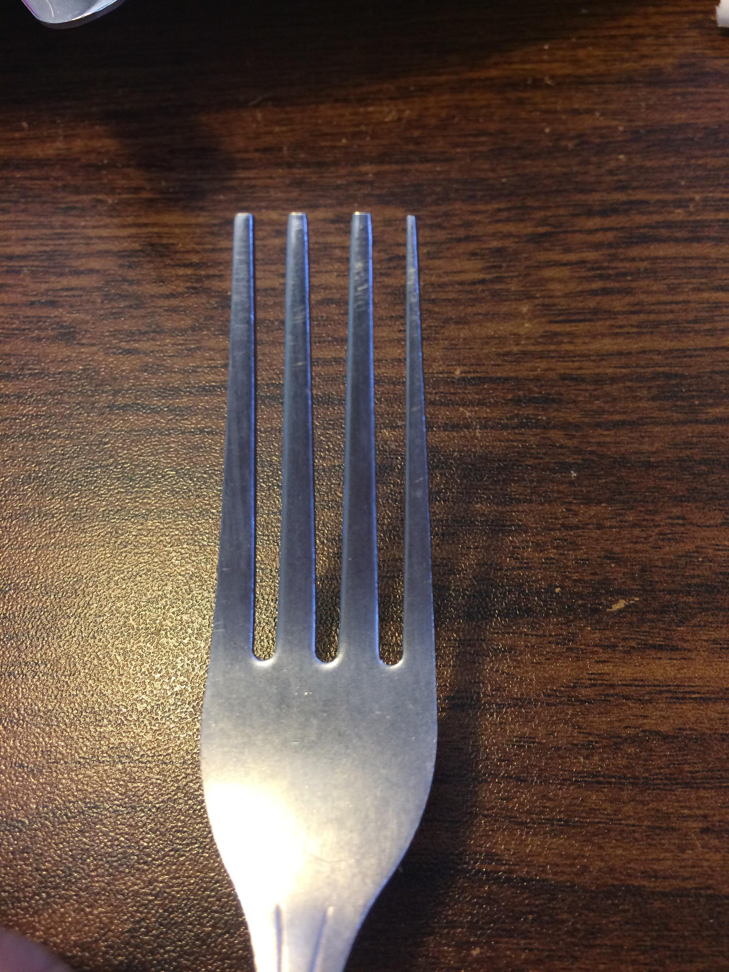 This fork has an underdeveloped 4th prong r/mildlyinteresting