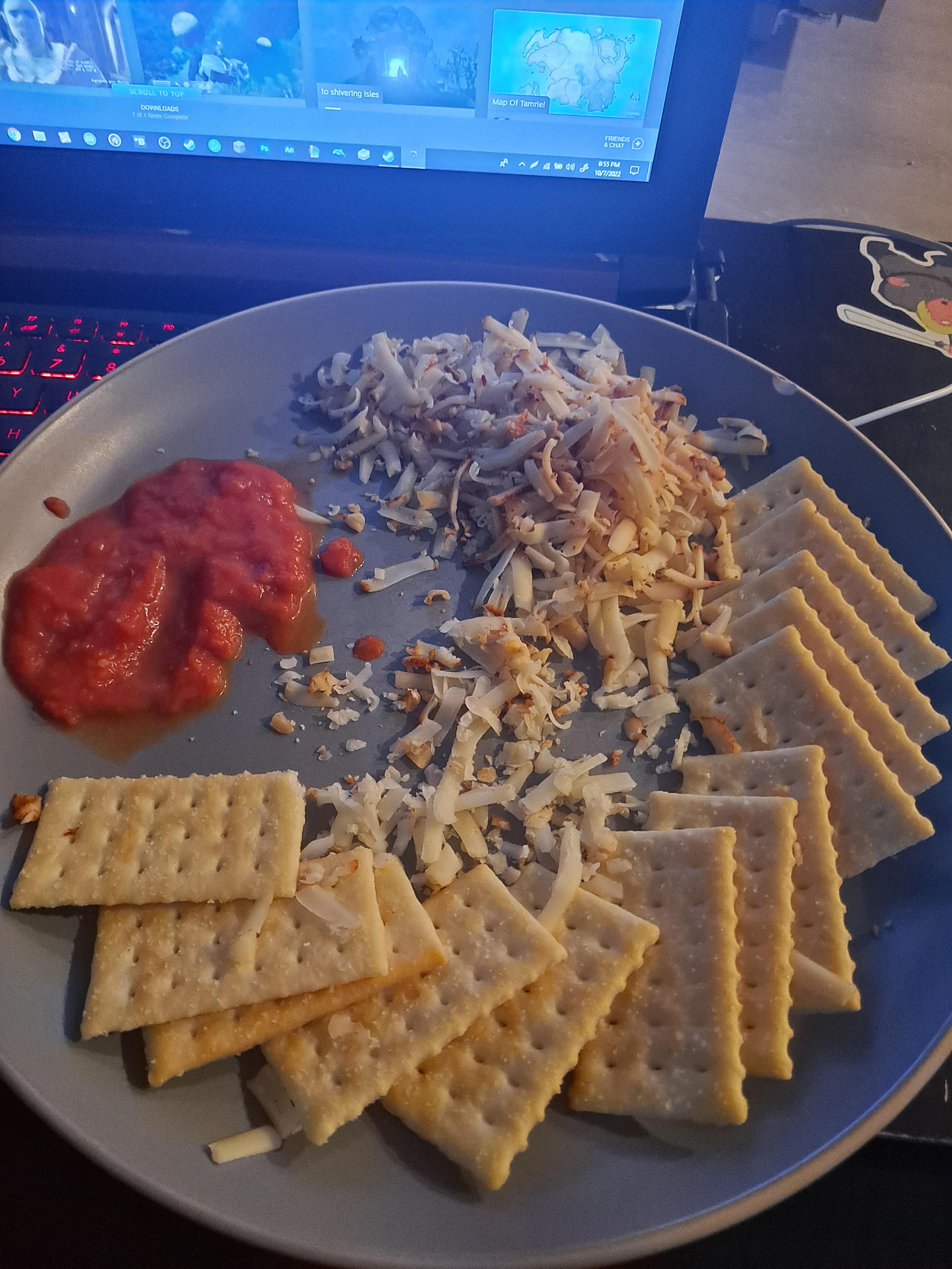four cheese marinara sauce, shredded cheese and crackers. it was