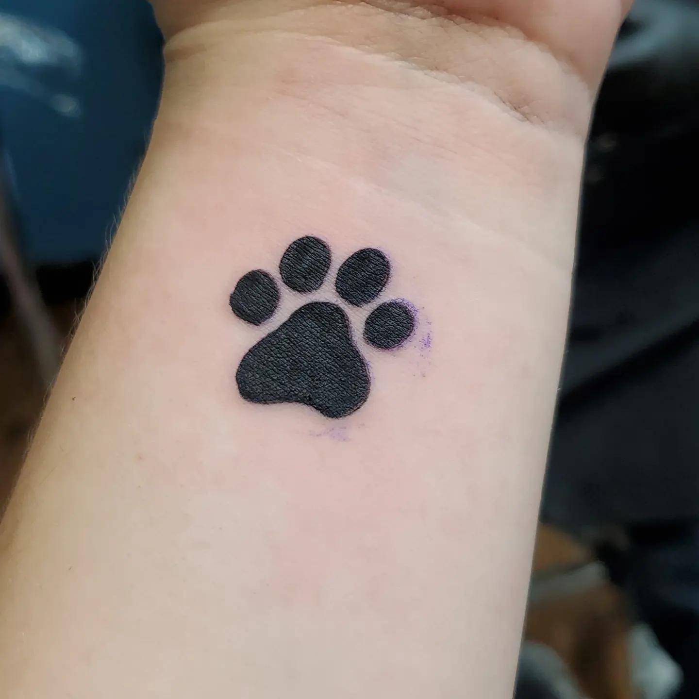 just a lil paw done by Jon at famous tattoo and body piercings ventura