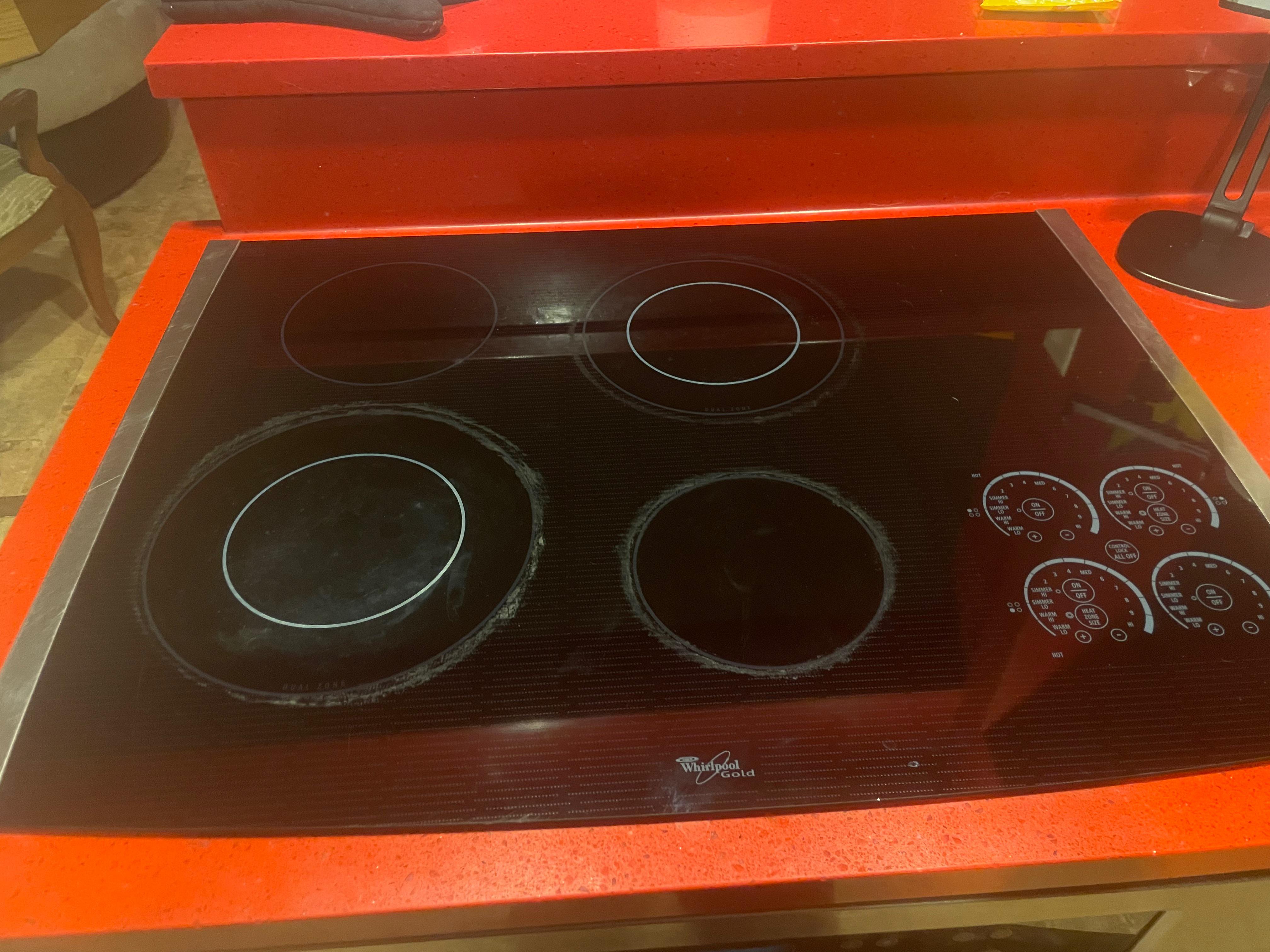 How to remove range ‘rings’? Turns out a long vinegar soak and clean