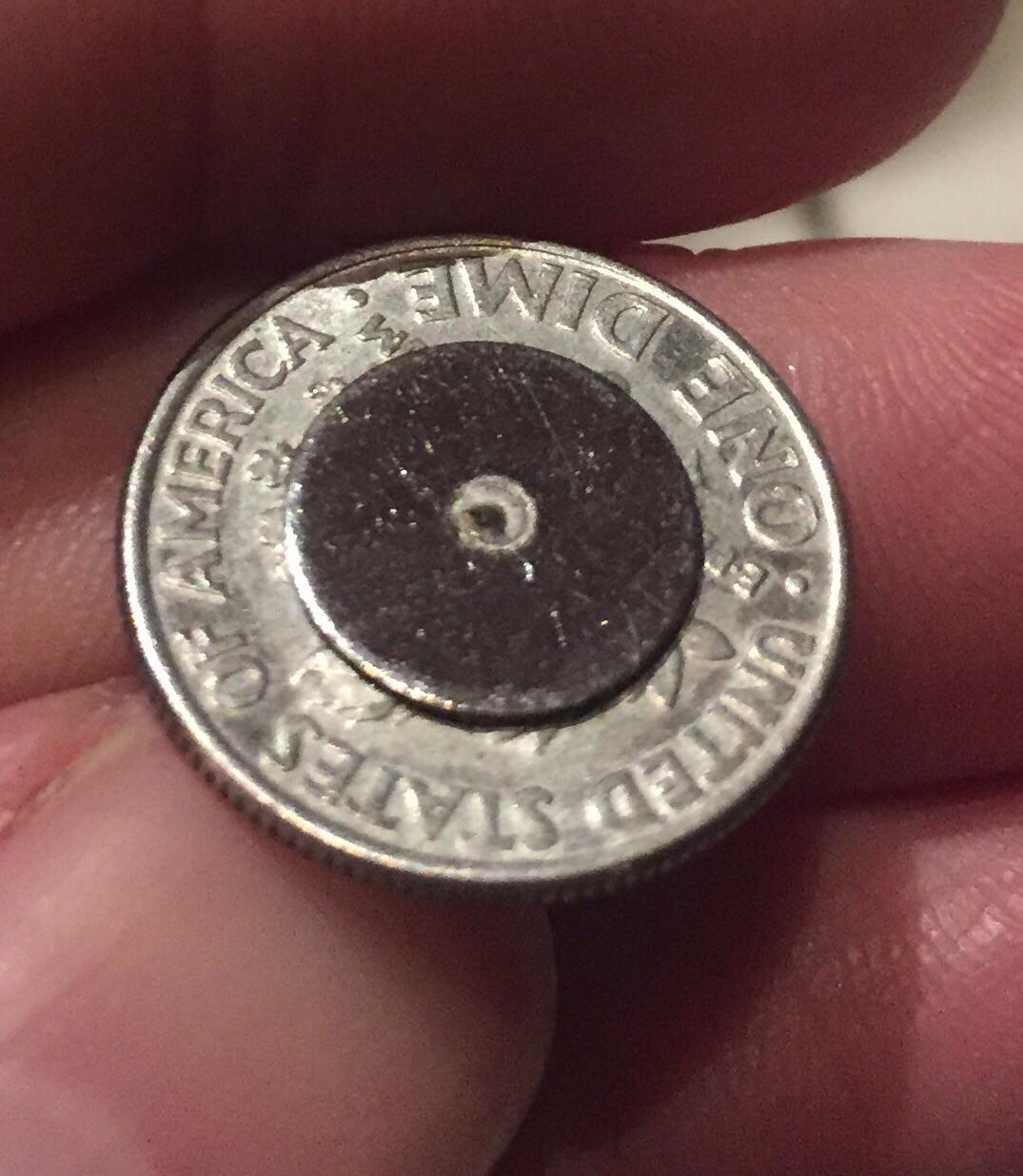 Thin Metal Disk Attached to 2001 Dime Ideas? r/coins