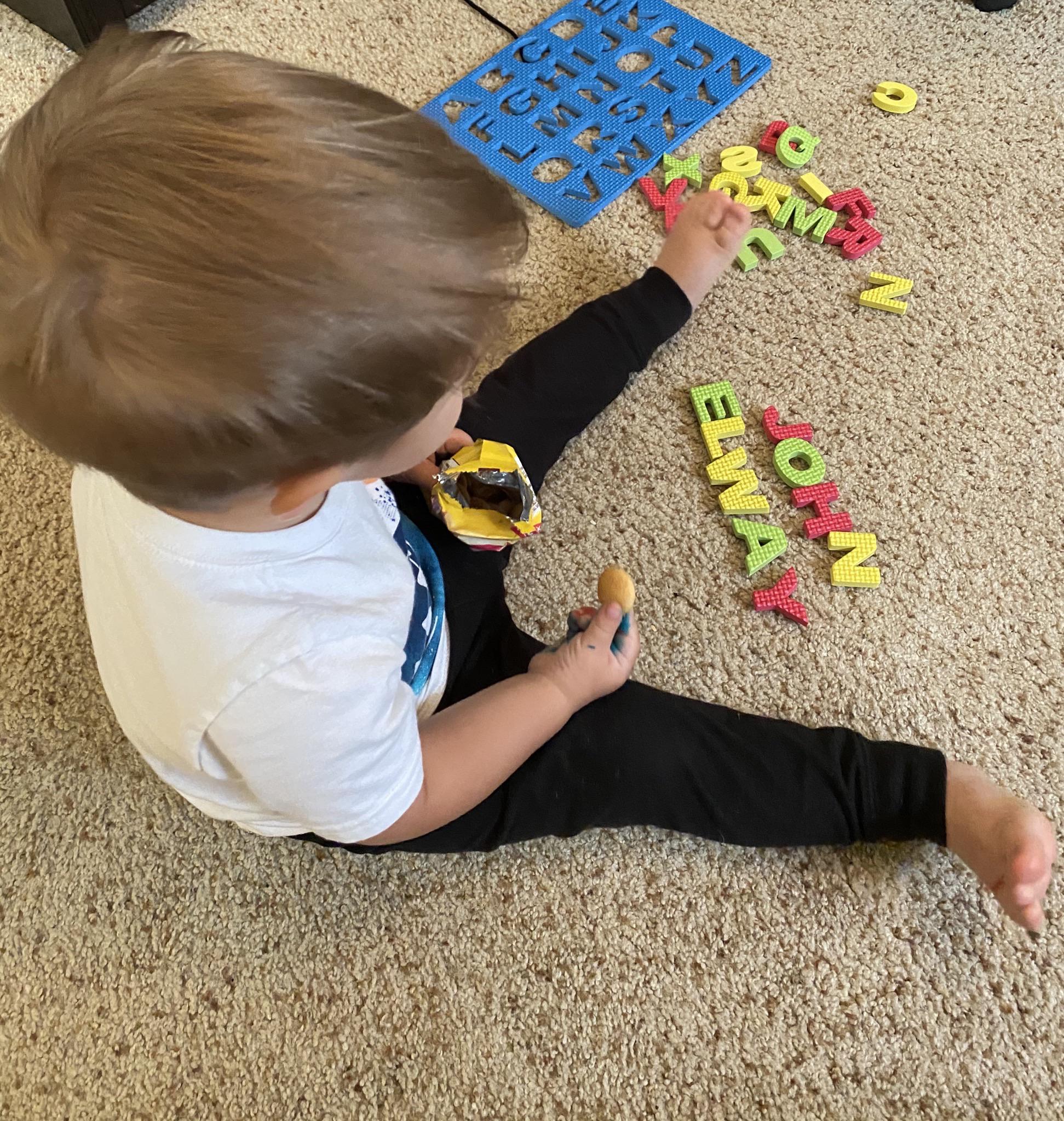 Look what my 1 almost 2 year old spelled today. (Not really but we can