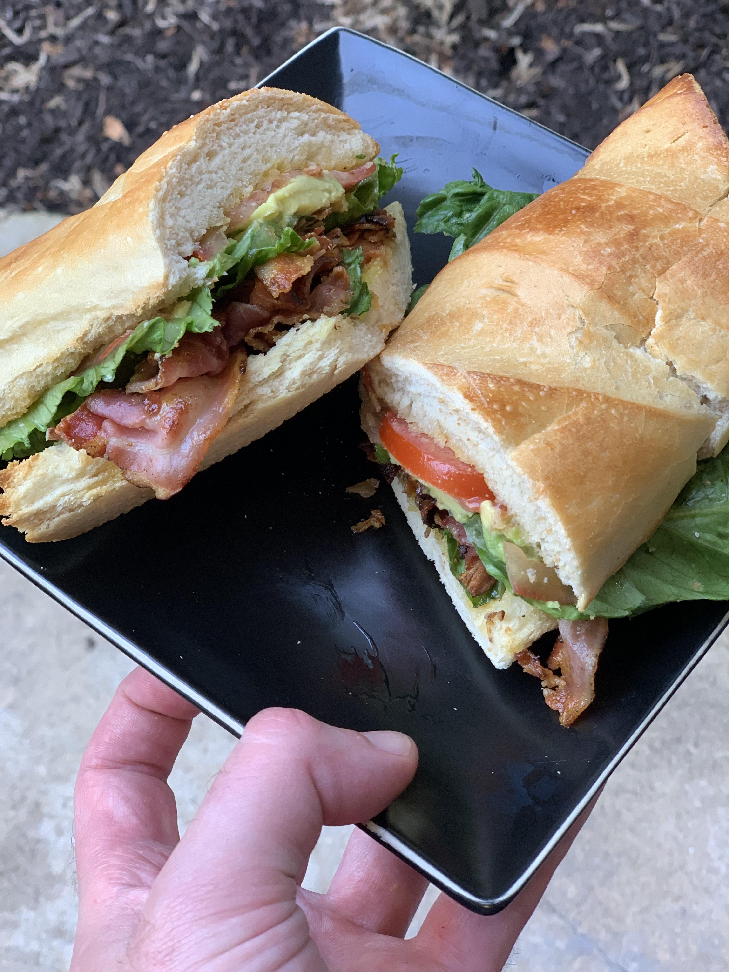 PLAT pancetta, lettuce, avocado, and tomato on toasted French with a