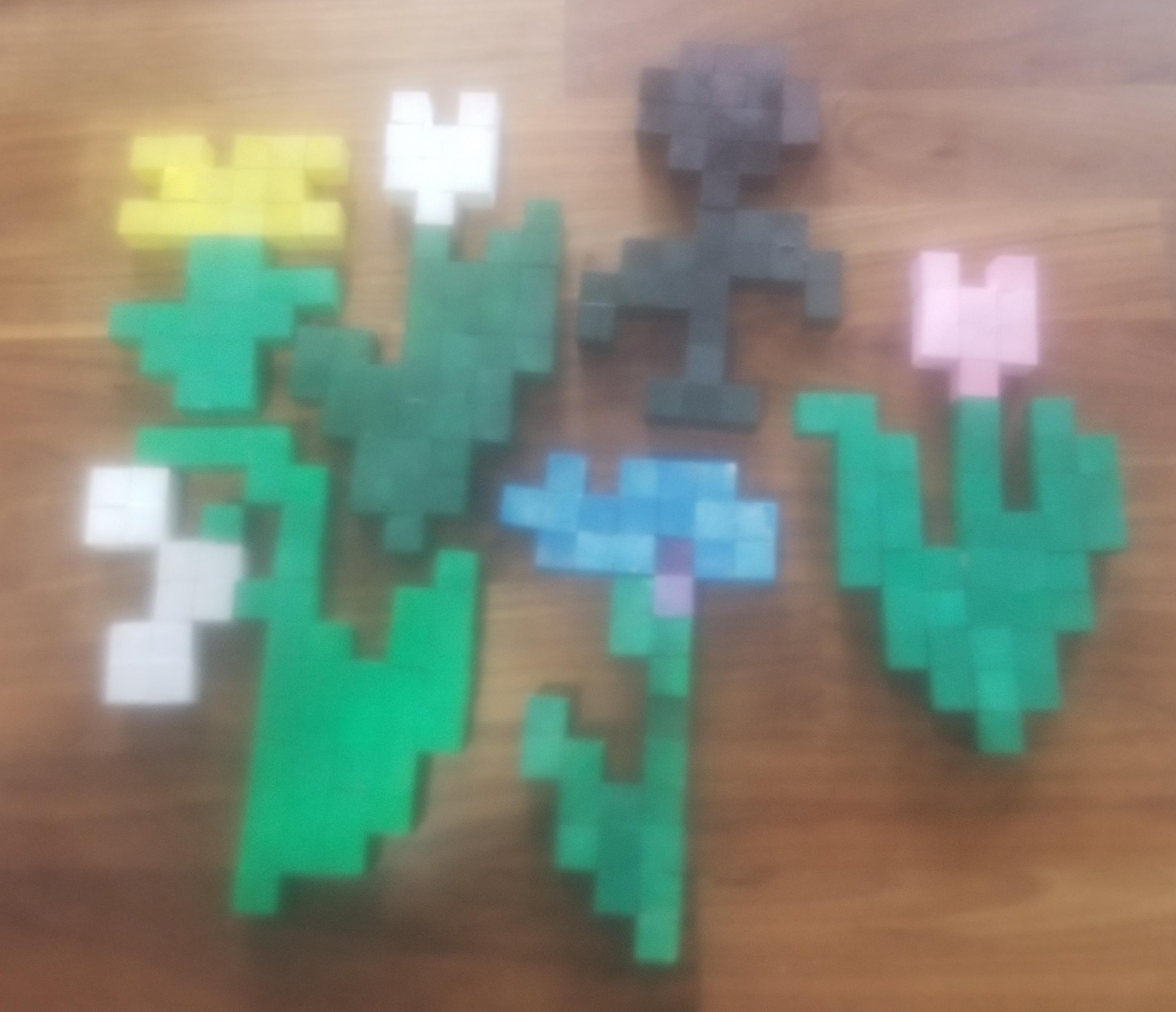 built some of the minecraft flowers with wooden blocks and paint