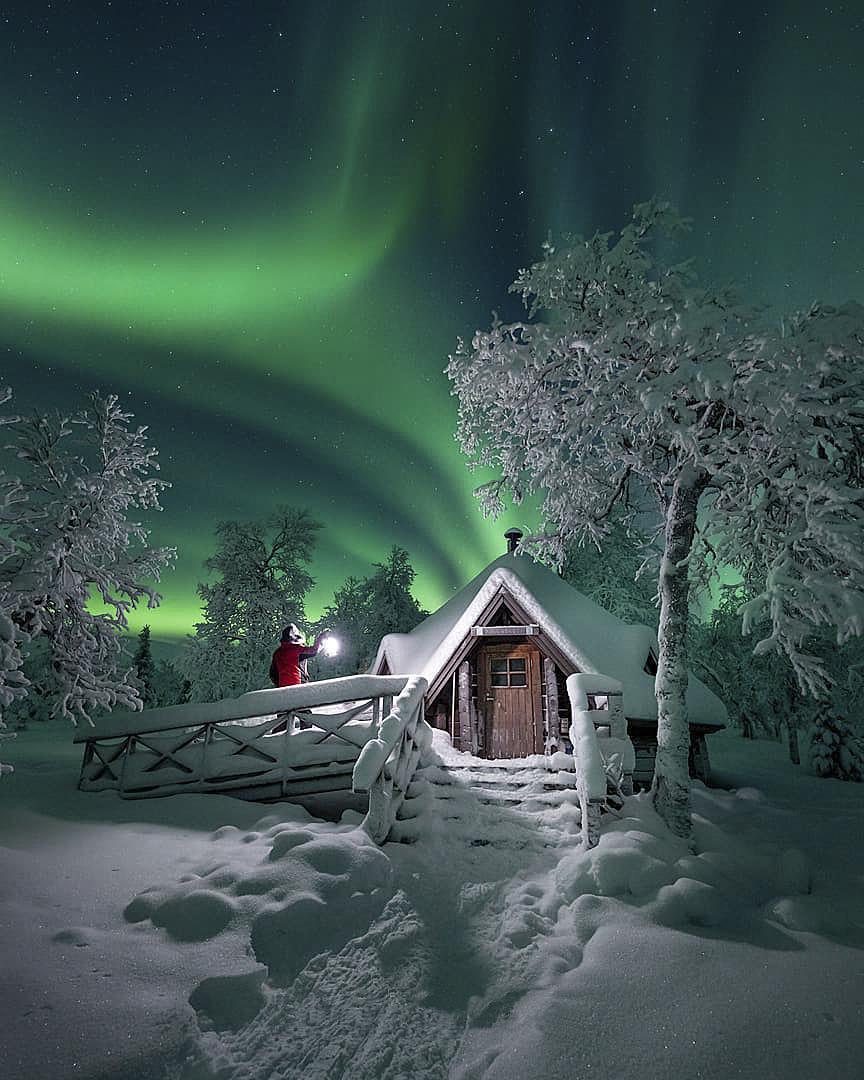 Aurora borealis over a small cabin in Lapland, Finland r/MostBeautiful
