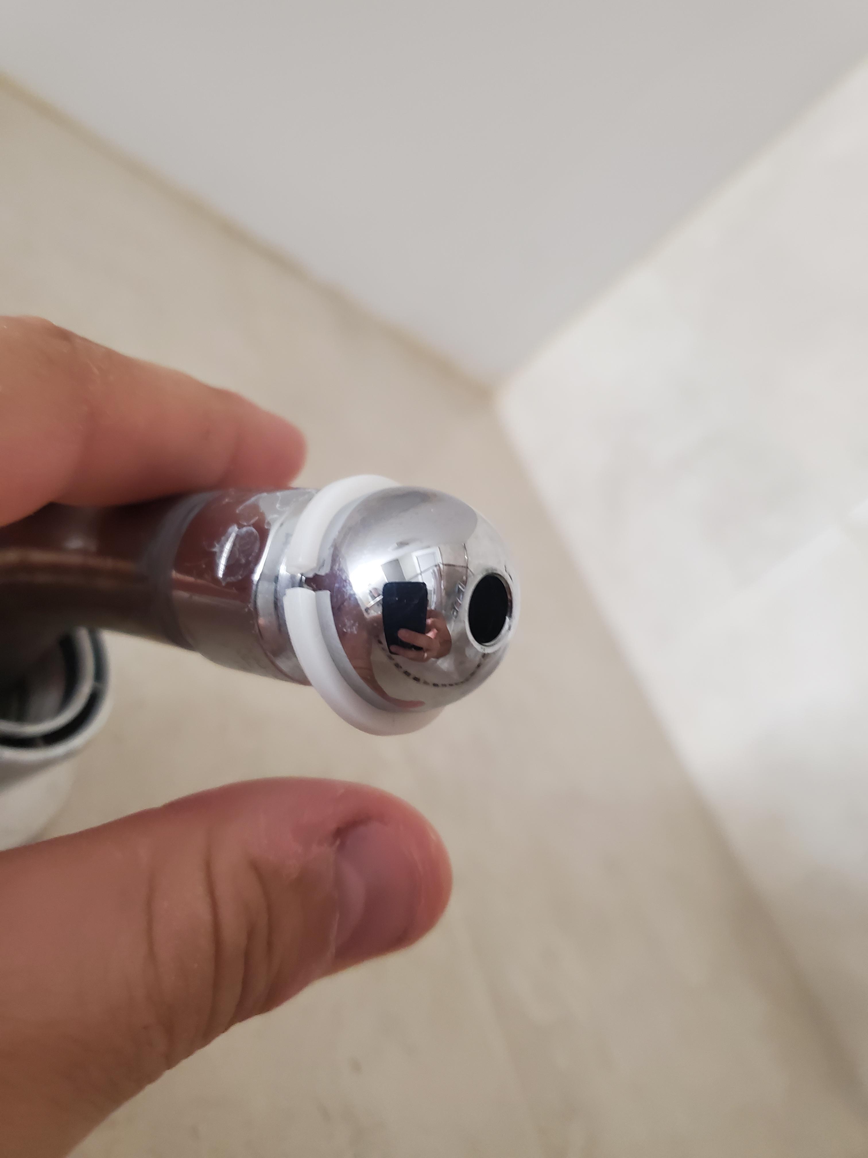 The white plastic washer on my shower heads swivel ball has cracked