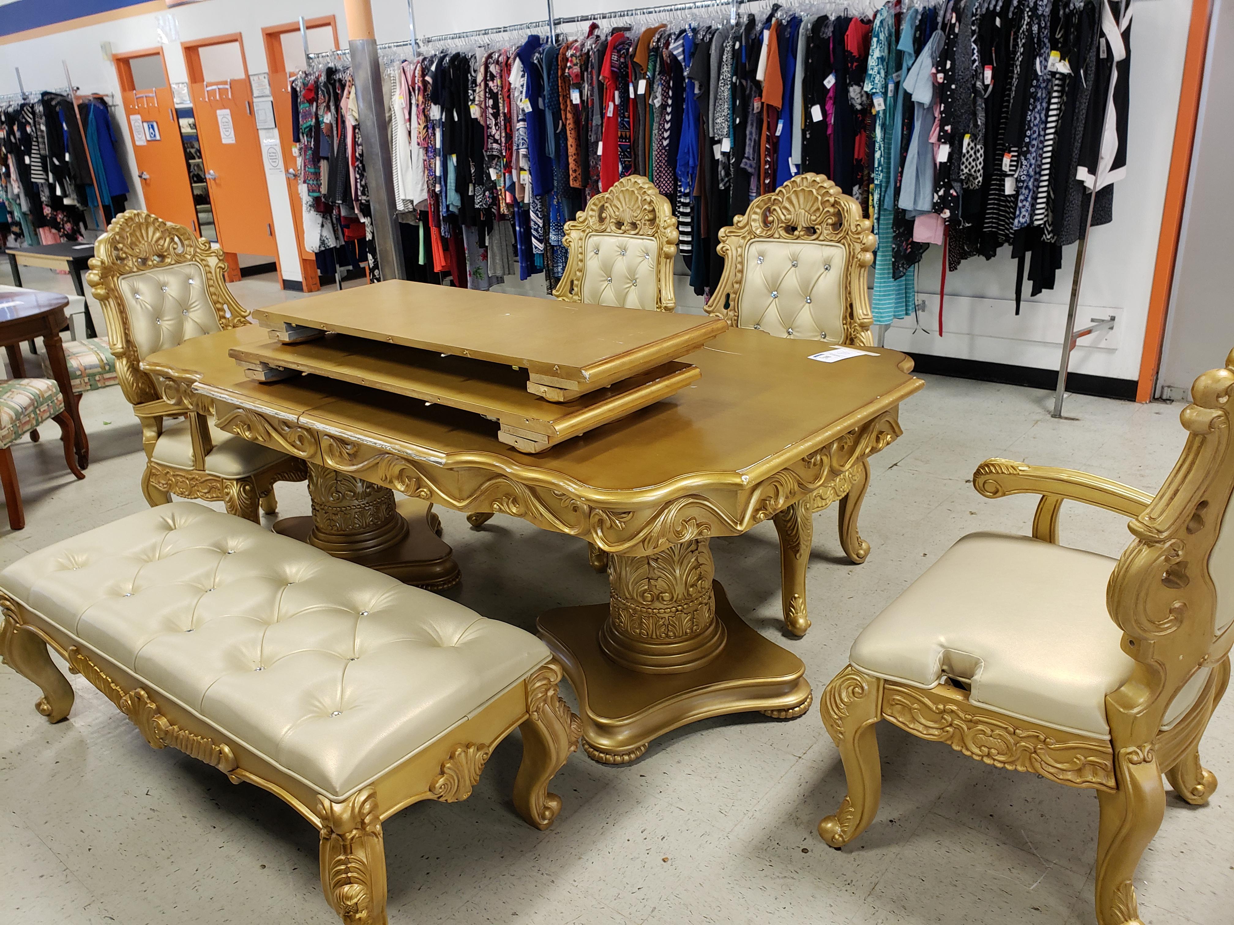 Catch and release this gold and rhinestone dining set at the local