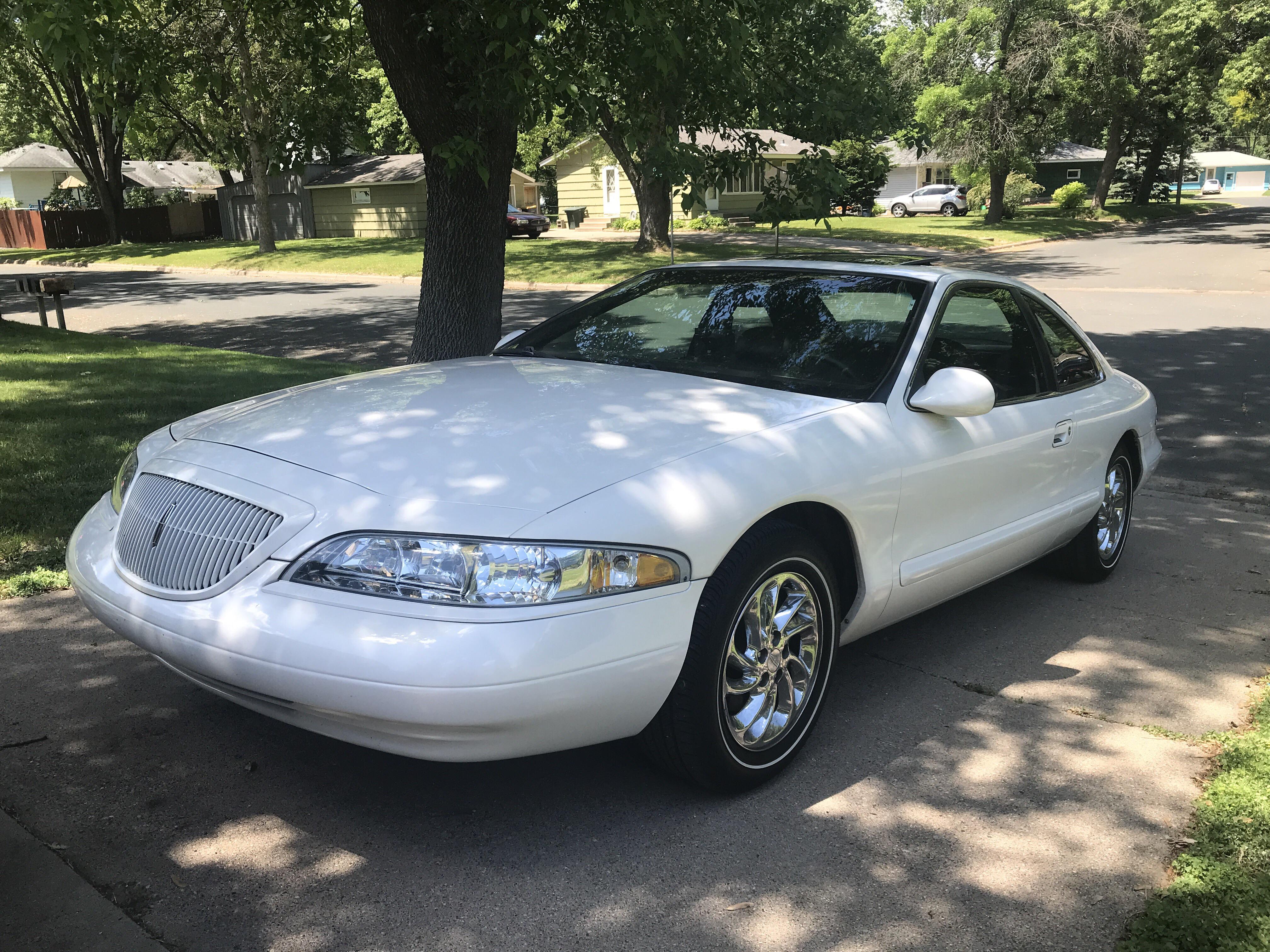 New to sub my pearlescent white 1998 Lincoln mark VIII lsc with only